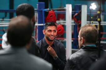 BOLTON, ENGLAND - JUNE 2: Amir Khan smiles during a television interview during a media day at The Amir Khan Academy on June 2, 2015 in Bolton, England. (Photo by Dave Thompson/Getty Images)