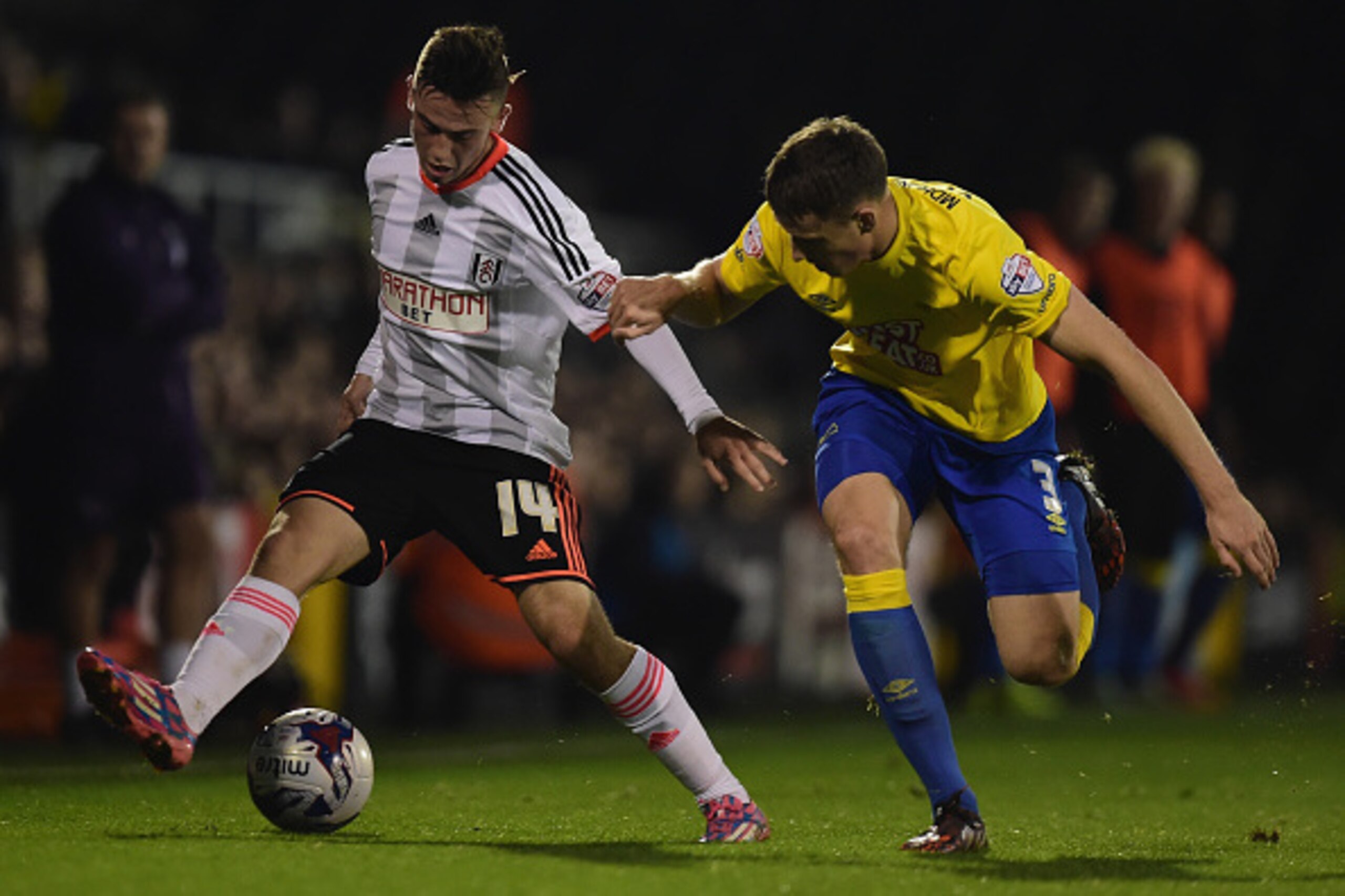 LONDON, ENGLAND - OCTOBER 28:  Patrick Roberts of Fulham battles with Craig Forsyth of Derby County during the Capital One Cup fourth round match between Fulham Derby County at Craven Cottage on October 28, 2014 in London, England.  (Photo by Jamie McDona