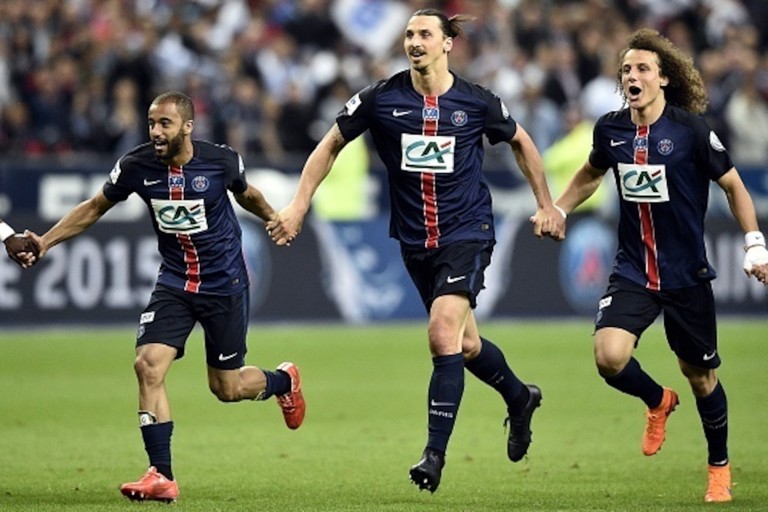 (from L) Paris Saint-Germain's Brazilian midfielder Lucas Moura, Paris Saint-Germain's Swedish forward Zlatan Ibrahimovic and Paris Saint-Germain's Brazilian defender David Luiz celebrate after winning the French Cup final football match against Auxerre a (from L) Paris Saint-Germain's Brazilian midfielder Lucas Moura, Paris Saint-Germain's Swedish forward Zlatan Ibrahimovic and Paris Saint-Germain's Brazilian defender David Luiz celebrate after winning the French Cup final football match against Auxerre a