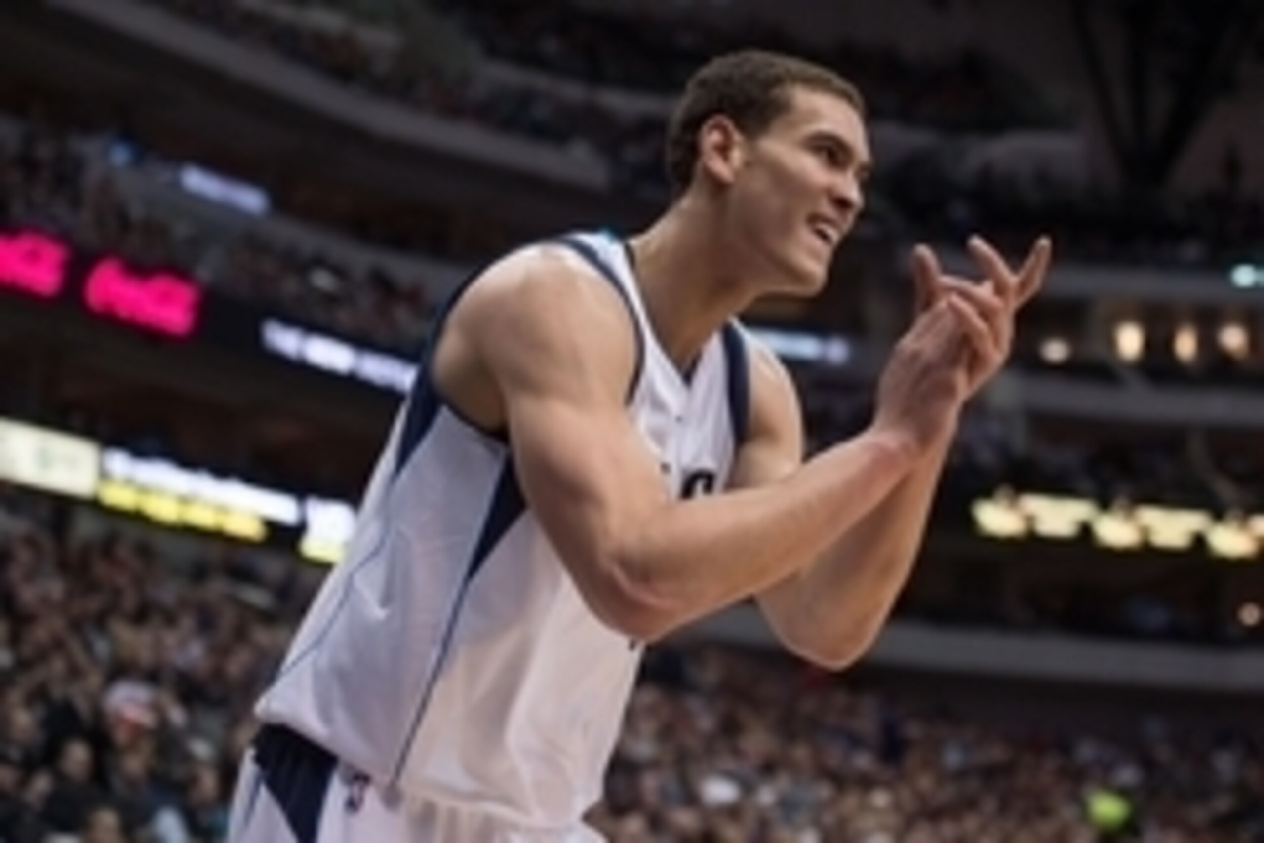 Jan 23, 2015; Dallas, TX, USA; Dallas Mavericks forward Dwight Powell (8) cheers on his team during the game against the Chicago Bulls at the American Airlines Center. The Bulls defeated the Mavericks 102-98. Mandatory Credit: Jerome Miron-USA TODAY Sport