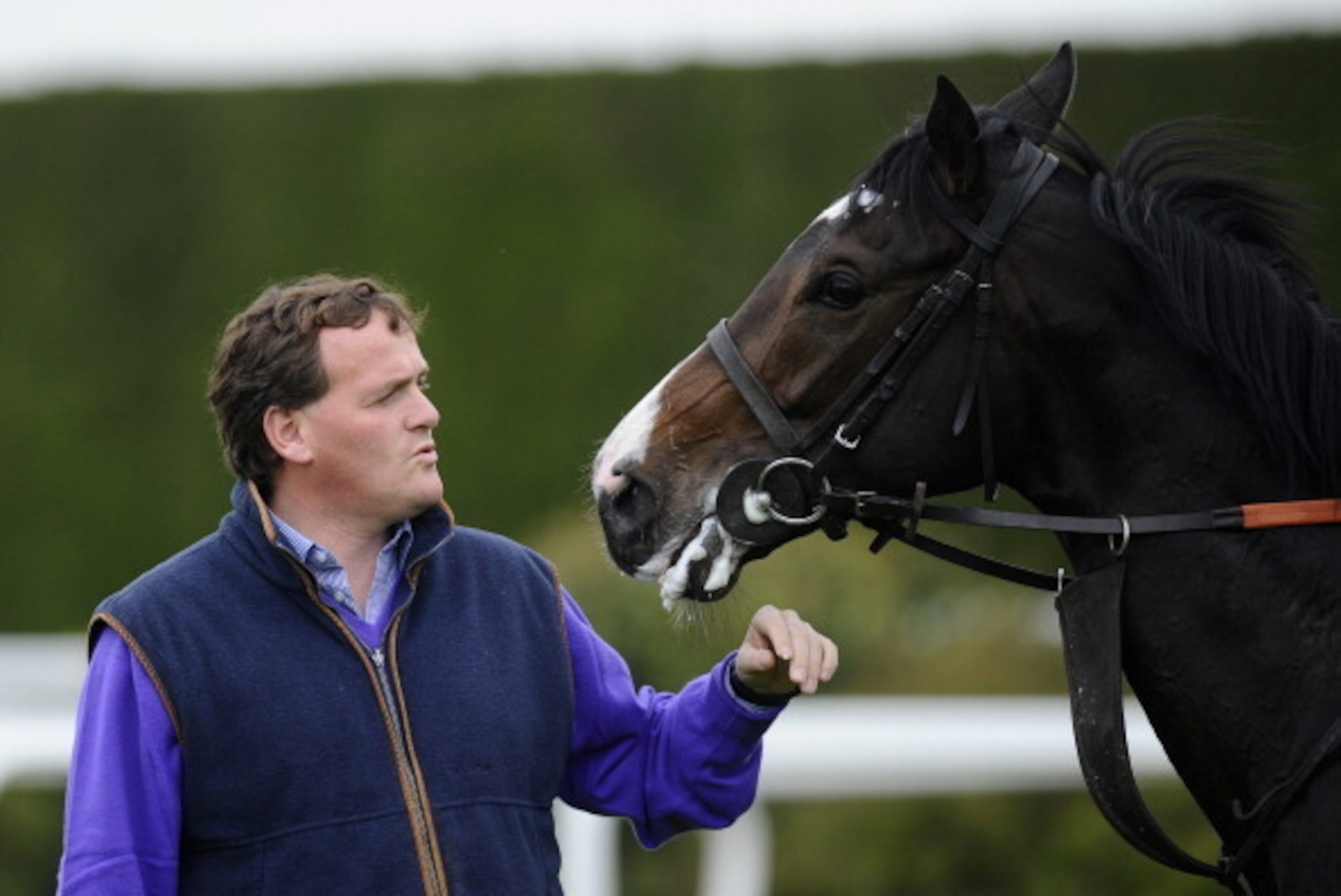 MARLBOROUGH, ENGLAND - APRIL 22: Richard Hannon with Toormore during a visit to Richard Hannon's Herridge Racing Stables on April 22, 2014 in Marlborough, England. (Photo by Alan Crowhurst/Getty Images)