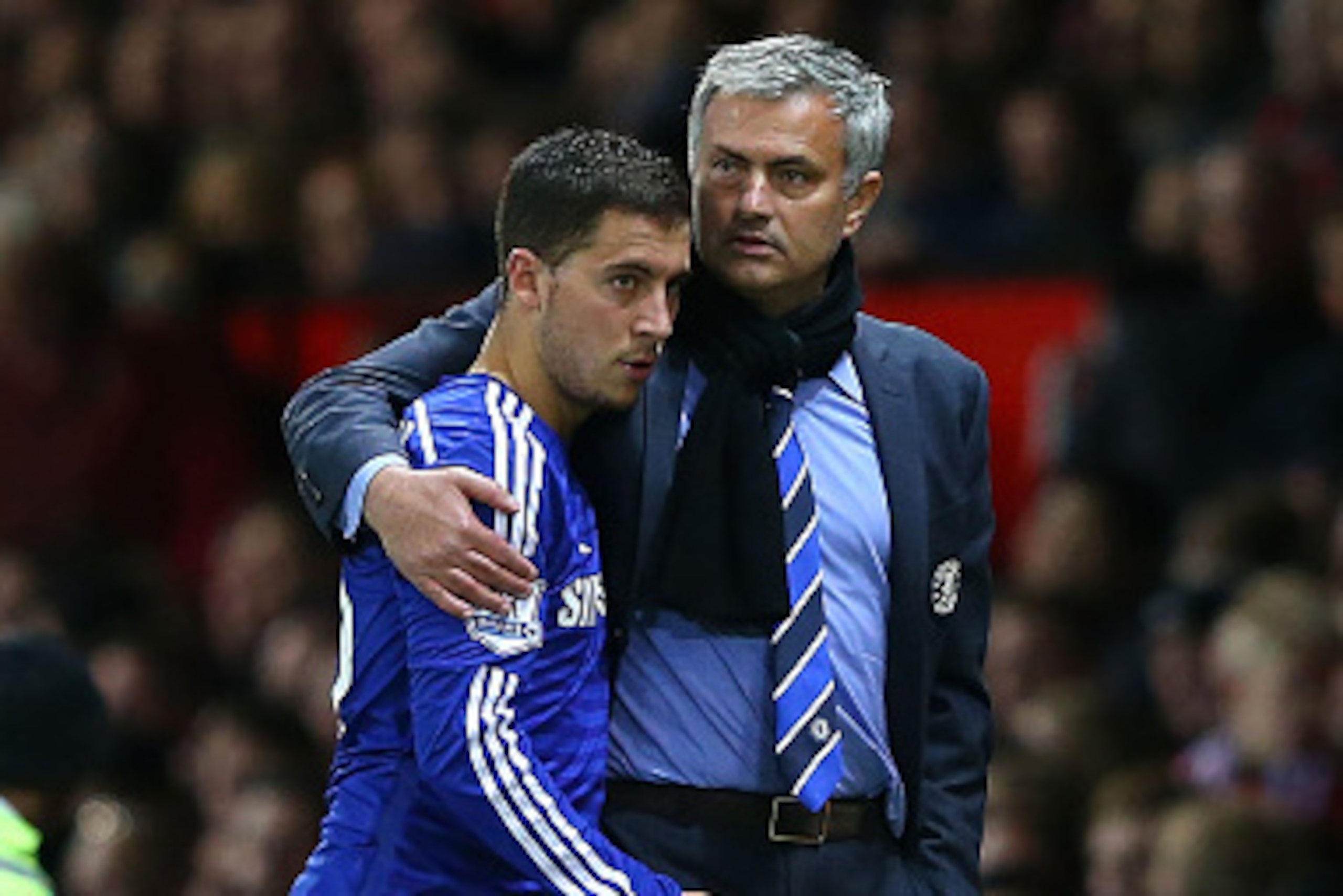MANCHESTER, ENGLAND - OCTOBER 26:  Chelsea Manager Jose Mourinho embraces Eden Hazard during the Barclays Premier League match between Manchester United and Chelsea at Old Trafford on October 26, 2014 in Manchester, England.  (Photo by Alex Livesey/Getty 