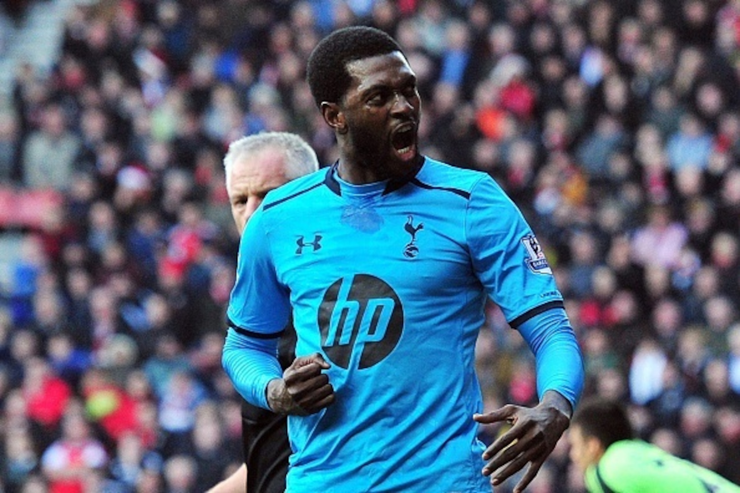 Tottenham Hotspur's Togolese striker Emmanuel Adebayor celebrates scoring their third goal during the English Premier League football match between Southampton and Tottenham Hotspur at St Mary's Stadium in Southampton, southern England on December 22, 201