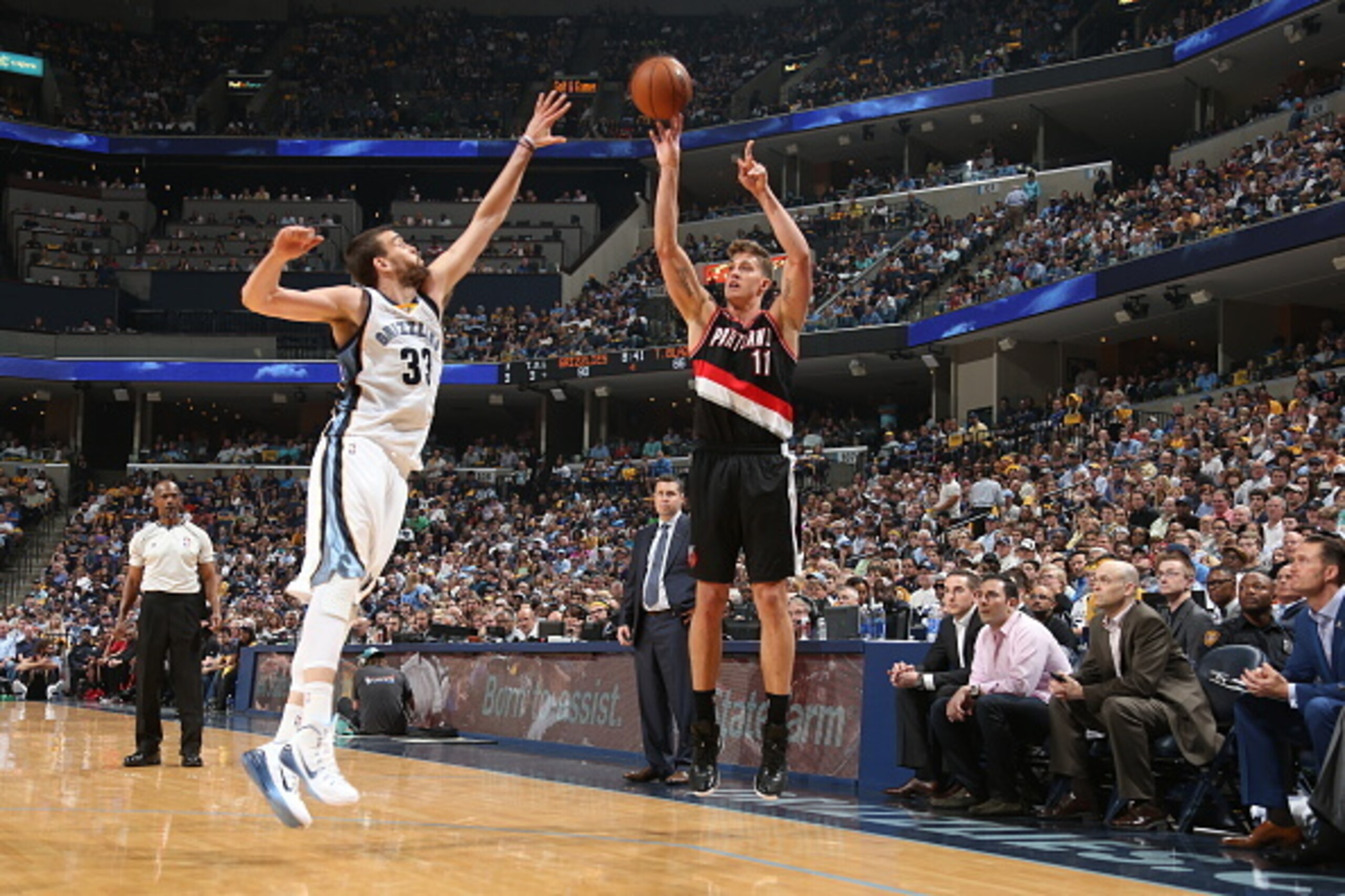 MEMPHIS, TN - APRIL 19:  Meyers Leonard #11 of the Portland Trail Blazers shoots against Marc Gasol #33 of the Memphis Grizzlies in Game One of the Western Conference Quarterfinals during the 2015 NBA Playoffs on April 19, 2015 at FedExForum in Memphis, T