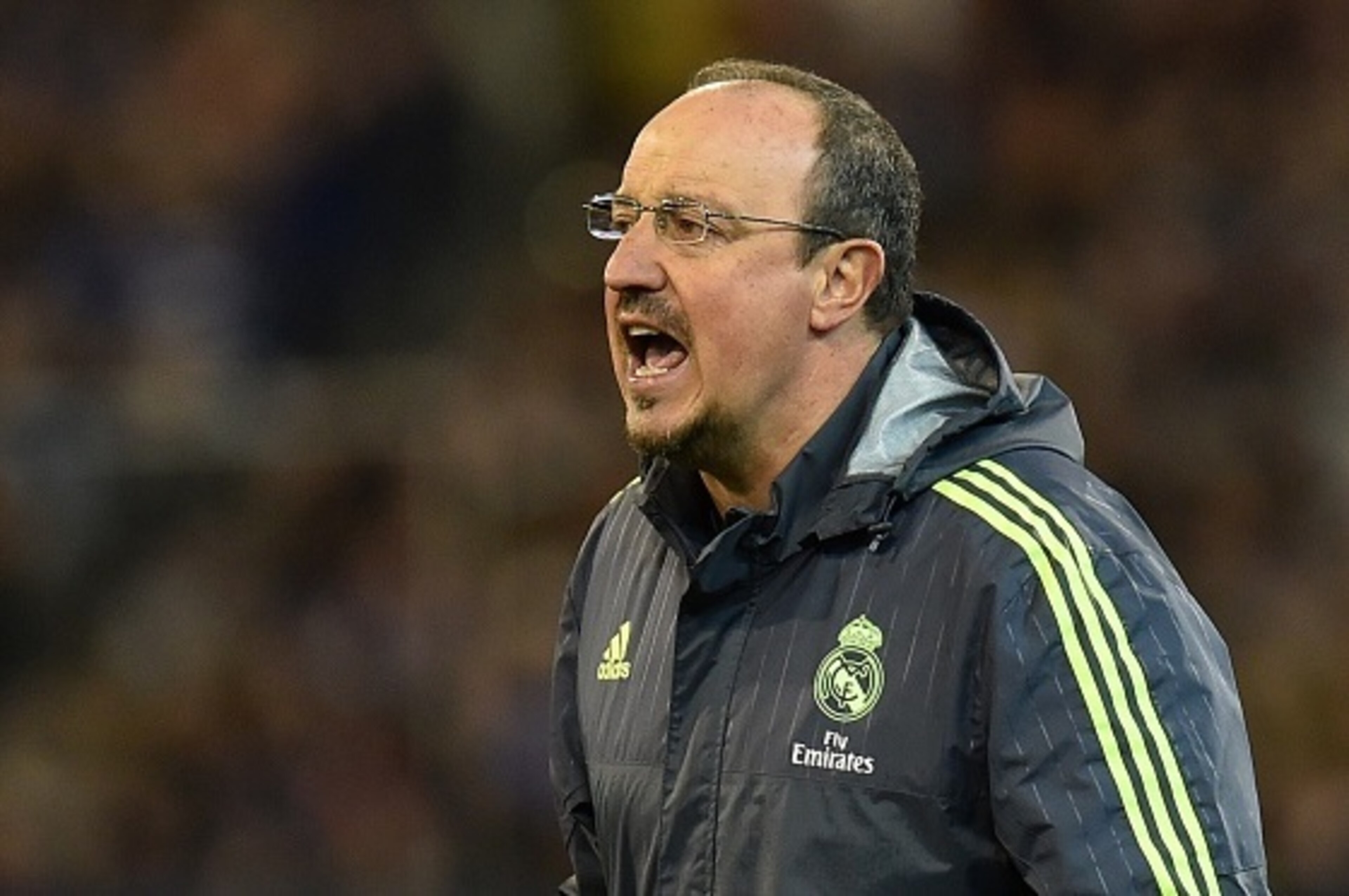 Real Madrid's coach Rafa Benitez reacts during the International Champions Cup football match between Real Madrid and AS Roma in Melbourne on July 18, 2015. AFP PHOTO / Paul CROCK -- IMAGE RESTRICTED TO EDITORIAL USE - STRICTLY NO COMMERCIAL USE        (P