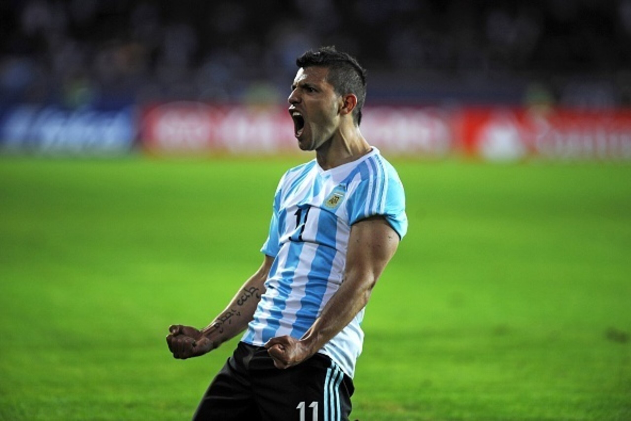 Argentinan football team player Sergio Aguero celebrates after scoring against Paraguay in the Copa America football match in La Serena, Chile on June 13, 2015.  AFP PHOTO / VLADIMIR RODAS        (Photo credit should read VLADIMIR RODAS/AFP/Getty Images)
