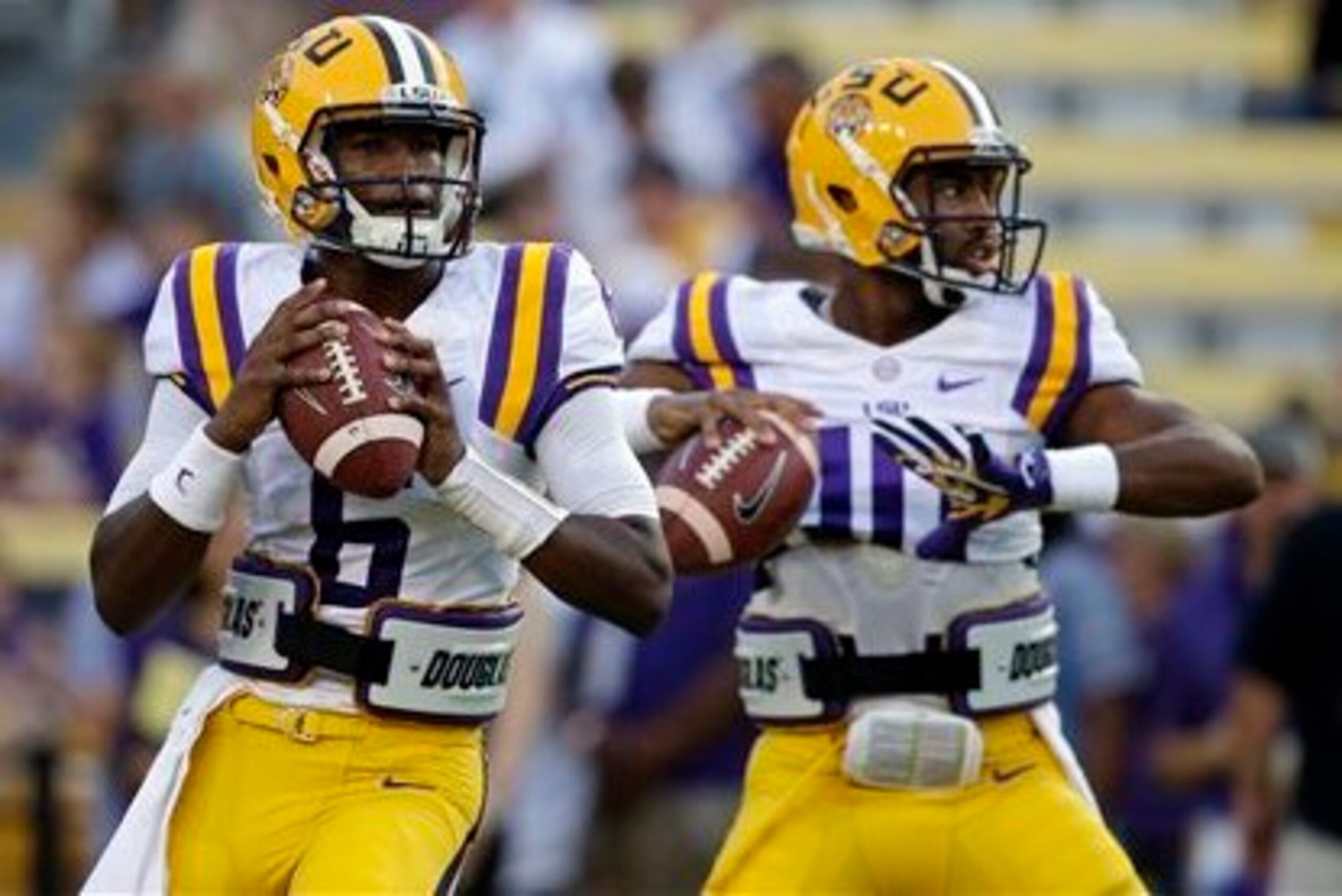 LSU QBs Brandon Harris (left) and Anthony Jennings (right)