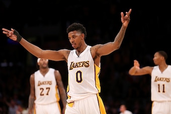 LOS ANGELES, CA - NOVEMBER 30:  Nick Young #0 of the Los Angeles Lakers celebrates in the fourth quarter against the Toronto Raptors at Staples Center on November 30, 2014 in Los Angeles, California. The Lakers 129-122 in overtime. NOTE TO USER: User expr