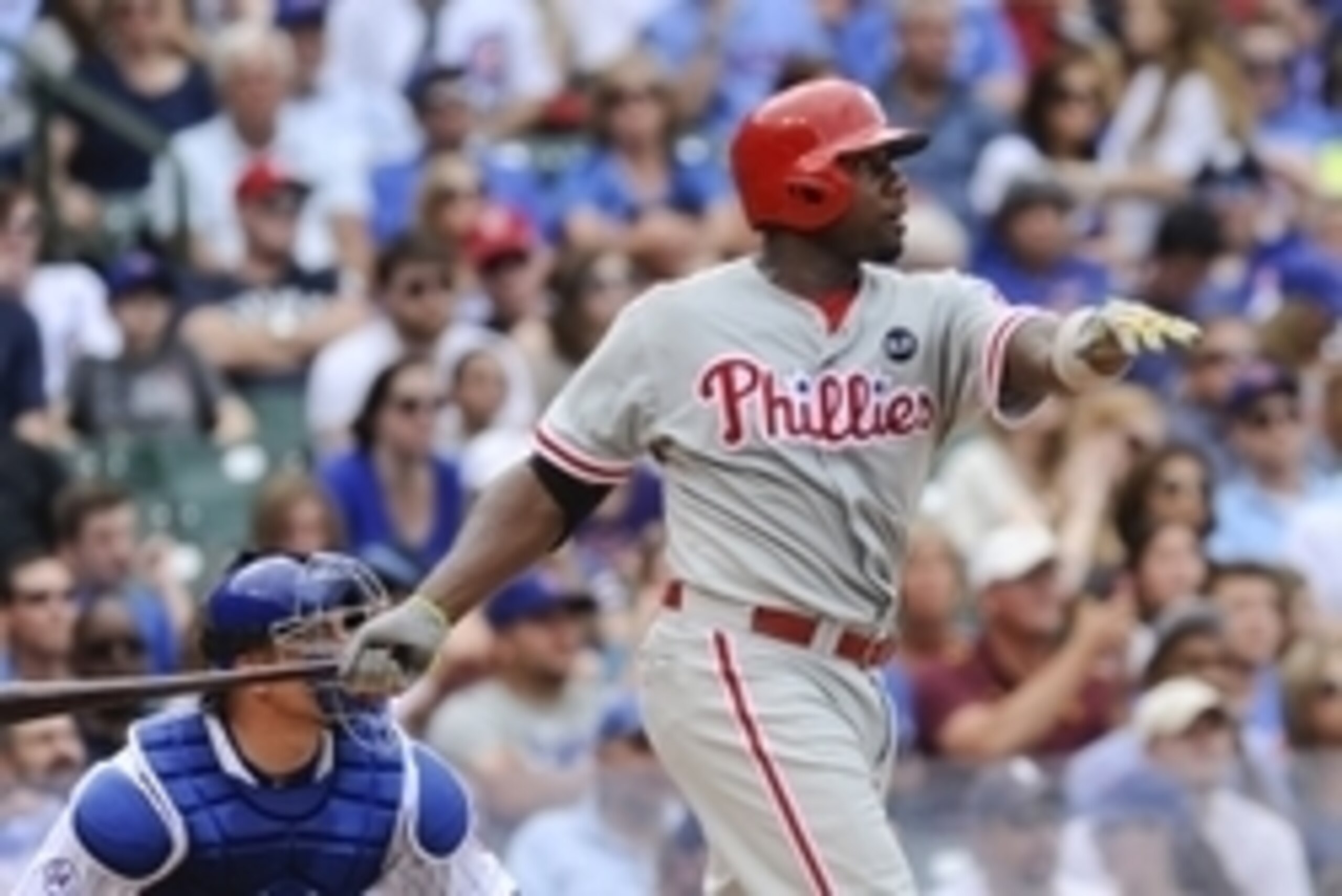 Jul 26, 2015; Chicago, IL, USA;  Philadelphia Phillies first baseman Ryan Howard (6) hits a two run homer in the eighth inning against the Chicago Cubs at Wrigley Field. Mandatory Credit: Matt Marton-USA TODAY Sports