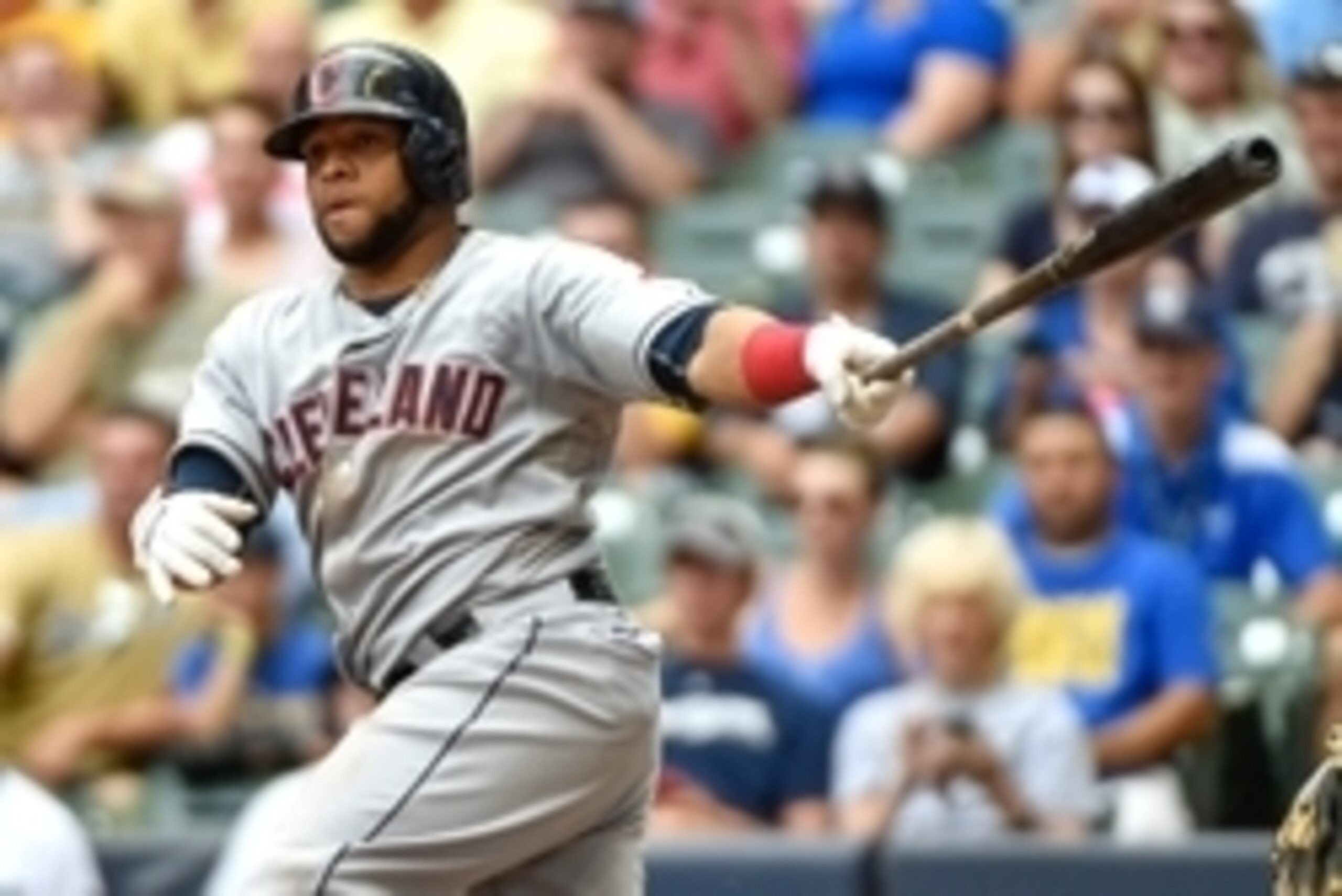 Jul 22, 2015; Milwaukee, WI, USA;  Cleveland Indians first baseman Carlos Santana (41) drives in a run with a double in the ninth inning against the Milwaukee Brewers at Miller Park. Mandatory Credit: Benny Sieu-USA TODAY Sports