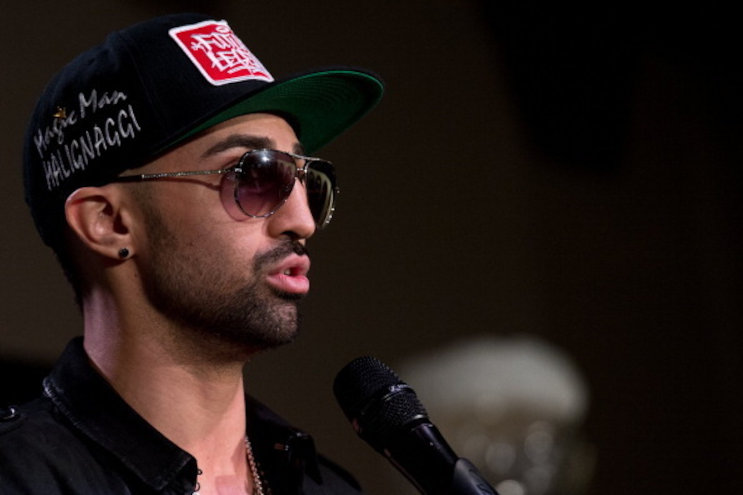 US boxer Paulie Malignaggi speaks during a press conference in Washington on April 17, 2014 ahead of his IBF welterweight title fight against compatriot Shawn Porter on April 19.    AFP PHOTO/Nicholas KAMM        (Photo credit should read NICHOLAS KAMM/AF