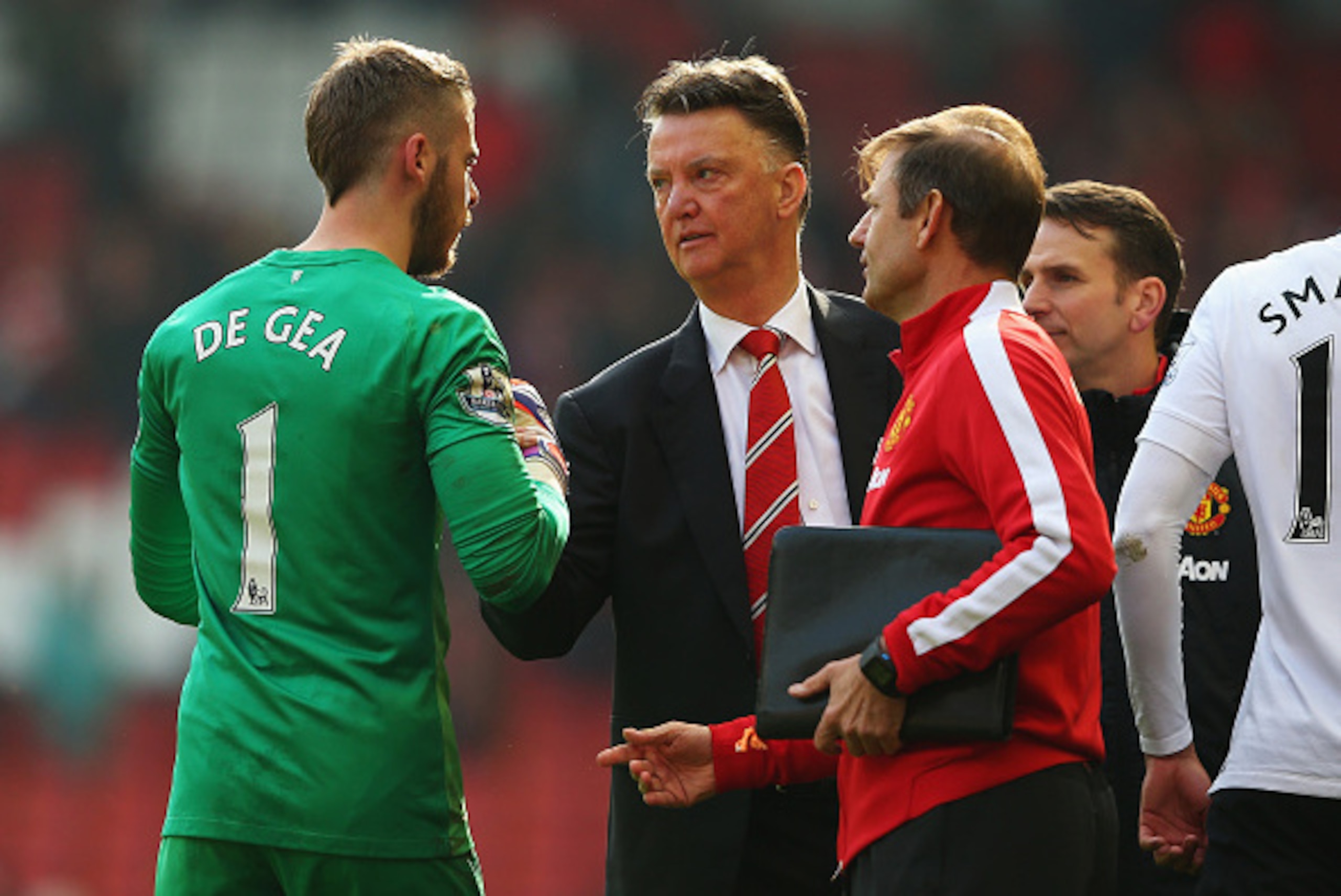 LIVERPOOL, ENGLAND - MARCH 22: Louis van Gaal, manager of Manchester United celebrates victory with David De Gea of Manchester United after the Barclays Premier League match between Liverpool and Manchester United at Anfield on March 22, 2015 in Liverpoo LIVERPOOL, ENGLAND - MARCH 22: Louis van Gaal, manager of Manchester United celebrates victory with David De Gea of Manchester United after the Barclays Premier League match between Liverpool and Manchester United at Anfield on March 22, 2015 in Liverpoo