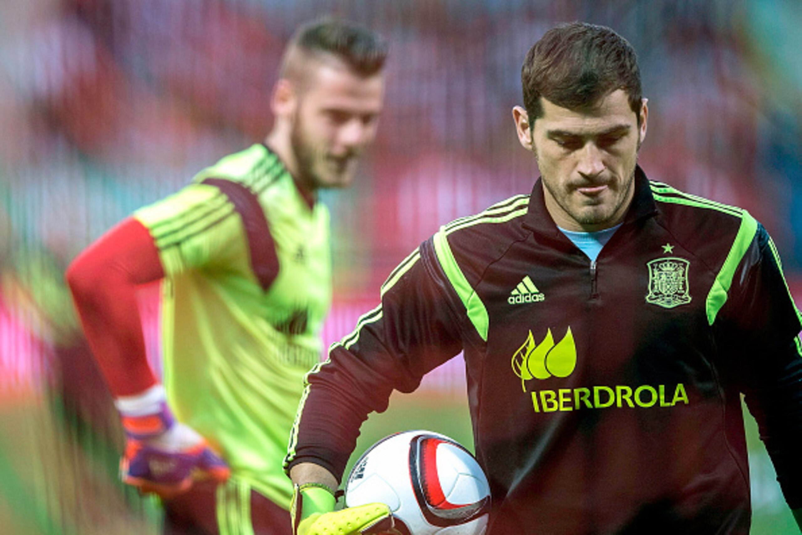 LEON, SPAIN - JUNE 11: Goalkeeper Iker Casillas (R) of Spain walks on ahead his teammate goalkeeper David de Gea (R) during their warming up prior to start the international friendly match between Spain and Costa Rica at Reino de Leon Stadium on June 11, LEON, SPAIN - JUNE 11: Goalkeeper Iker Casillas (R) of Spain walks on ahead his teammate goalkeeper David de Gea (R) during their warming up prior to start the international friendly match between Spain and Costa Rica at Reino de Leon Stadium on June 11,