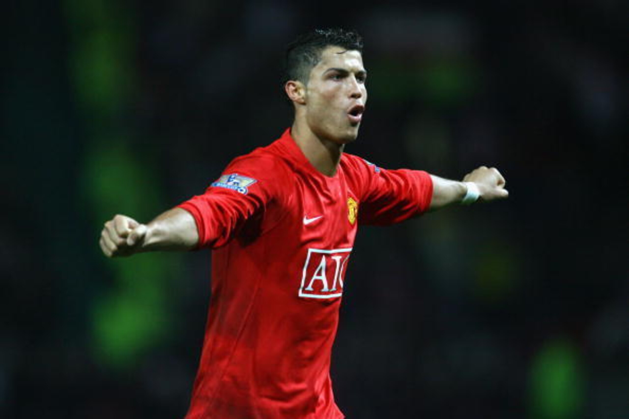 MANCHESTER, UNITED KINGDOM - NOVEMBER 15:  Cristiano Ronaldo of Manchester United celebrates  scoring his team's fifth goal during the Barclays Premier League match between Manchester United and Stoke City at Old Trafford on November 15, 2008 in Mancheste