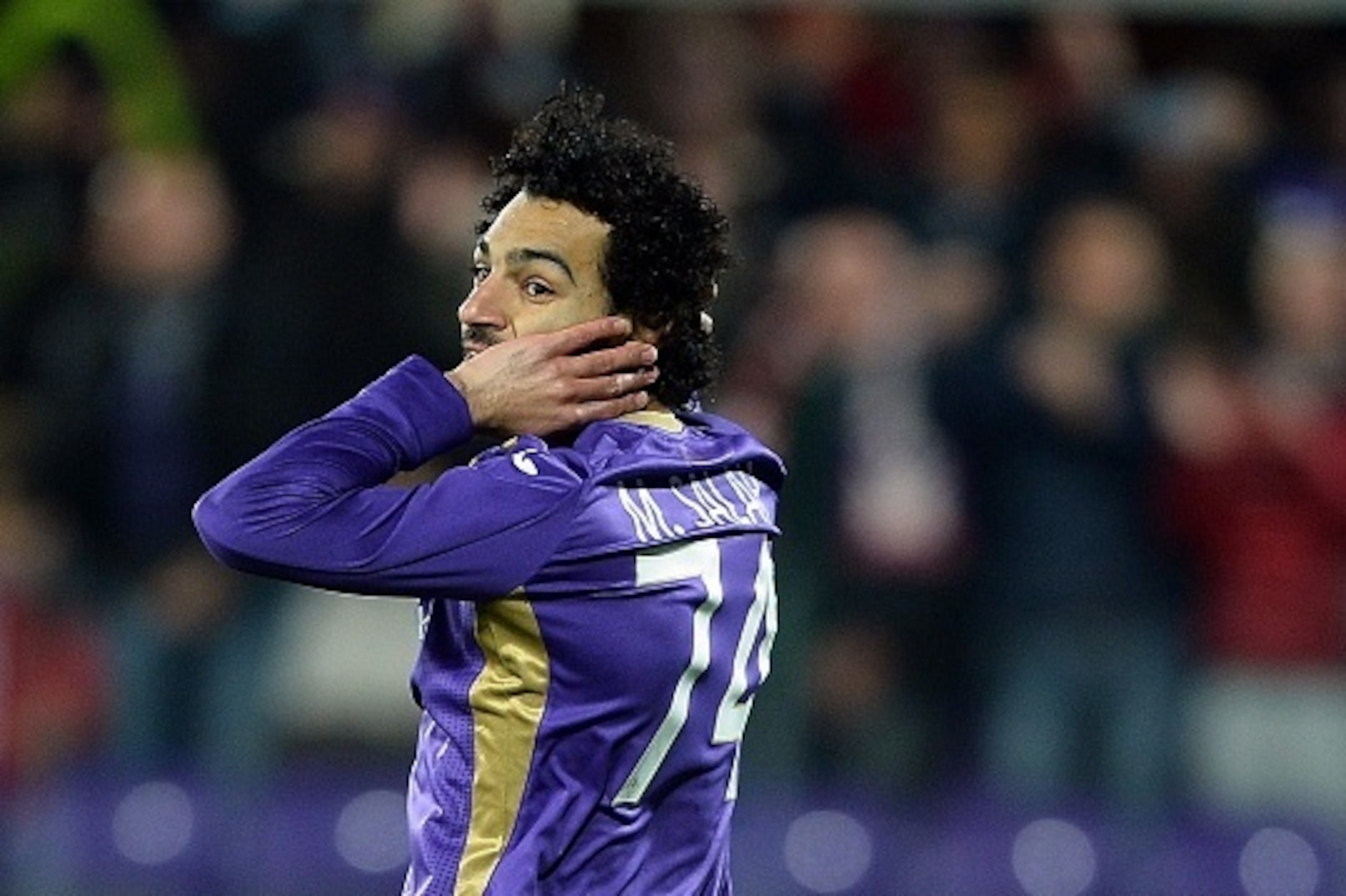 Fiorentina's forward Mohamed Salah Ghaly of Egypt reacts during the Italian Tim Cup semifinal return football match Fiorentina vs Juventus at the Artemio Franchi Stadium in Florence on April 7, 2015. AFP PHOTO / FILIPPO MONTEFORTE (Photo credit sho Fiorentina's forward Mohamed Salah Ghaly of Egypt reacts during the Italian Tim Cup semifinal return football match Fiorentina vs Juventus at the Artemio Franchi Stadium in Florence on April 7, 2015. AFP PHOTO / FILIPPO MONTEFORTE (Photo credit sho