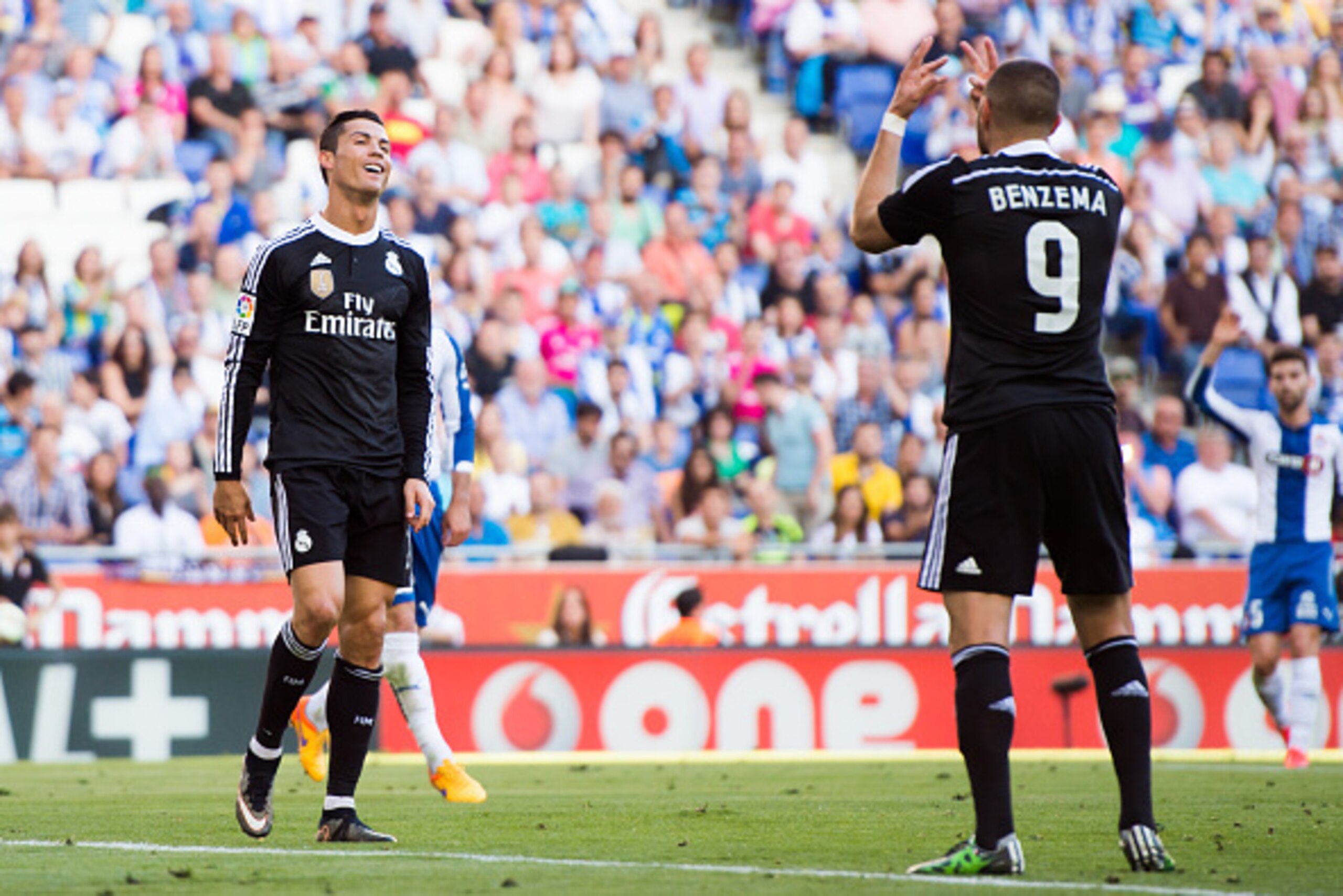 BARCELONA, SPAIN - MAY 17: Cristiano Ronaldo (L) and Karim Benzema (R) of Real Madrid CF react during the La Liga match between RCD Espanyol and Real Madrid CF at Cornella-El Prat Stadium on May 17, 2015 in Barcelona, Spain. (Photo by Alex Caparros/Getty BARCELONA, SPAIN - MAY 17: Cristiano Ronaldo (L) and Karim Benzema (R) of Real Madrid CF react during the La Liga match between RCD Espanyol and Real Madrid CF at Cornella-El Prat Stadium on May 17, 2015 in Barcelona, Spain. (Photo by Alex Caparros/Getty