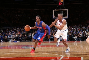 NEW YORK, NY - APRIL 15:  Reggie Jackson #1 of the Detroit Pistons drives to the basket against Tim Hardaway Jr. #5 of the New York Knicks on April 15, 2015 at Madison Square Garden in New York City.  NOTE TO USER: User expressly acknowledges and agrees t