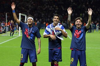 BERLIN, GERMANY - JUNE 6: Neymar Jr, Luis Suarez and Lionel Messi of Barcelona celebrate the victory after the UEFA Champions League Final between Juventus Turin and FC Barcelona at Olympiastadion on June 6, 2015 in Berlin, Germany. (Photo by Jean Catuffe