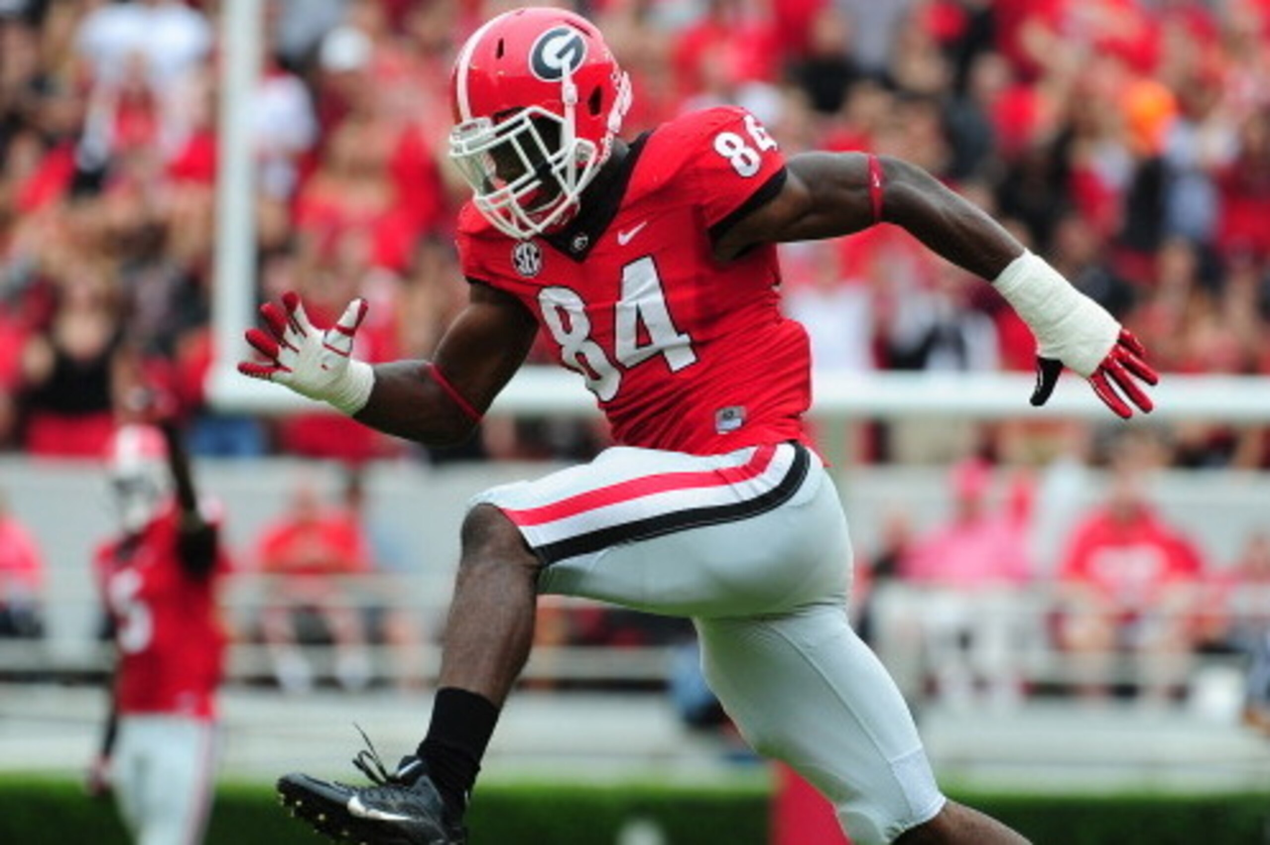 ATHENS, GA - SEPTEMBER 21: Leonard Floyd #84 of the Georgia Bulldogs celebrates after making a tackle against the North Texas Mean Green at Sanford Stadium on September 21, 2013 in Athens, Georgia. (Photo by Scott Cunningham/Getty Images)