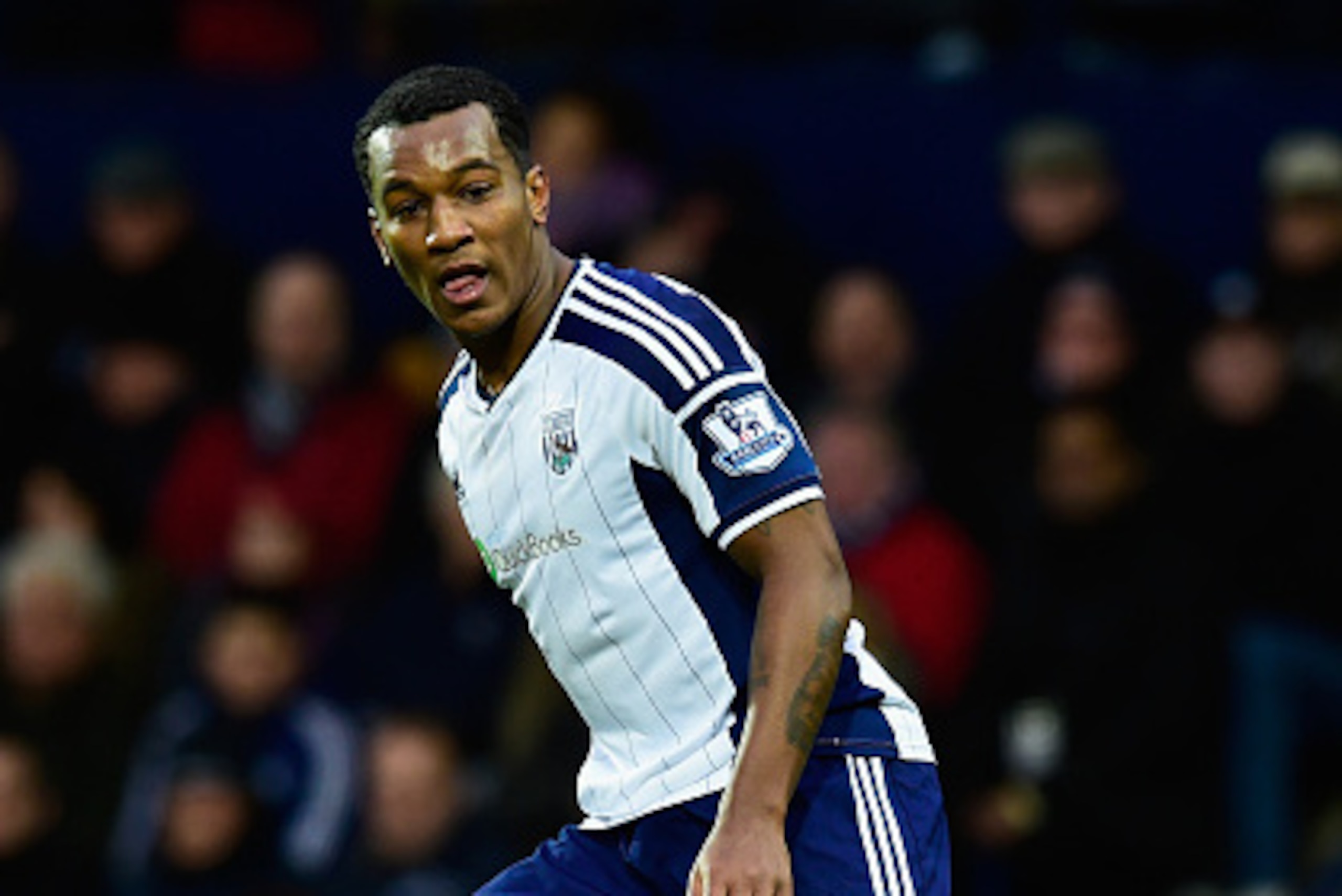 WEST BROMWICH, ENGLAND - JANUARY 31:  WBA player Andre Wisdom in action during the Barclays Premier League match between West Bromwich Albion and Tottenham Hotspur at The Hawthorns on January 31, 2015 in West Bromwich, England.  (Photo by Stu Forster/Gett