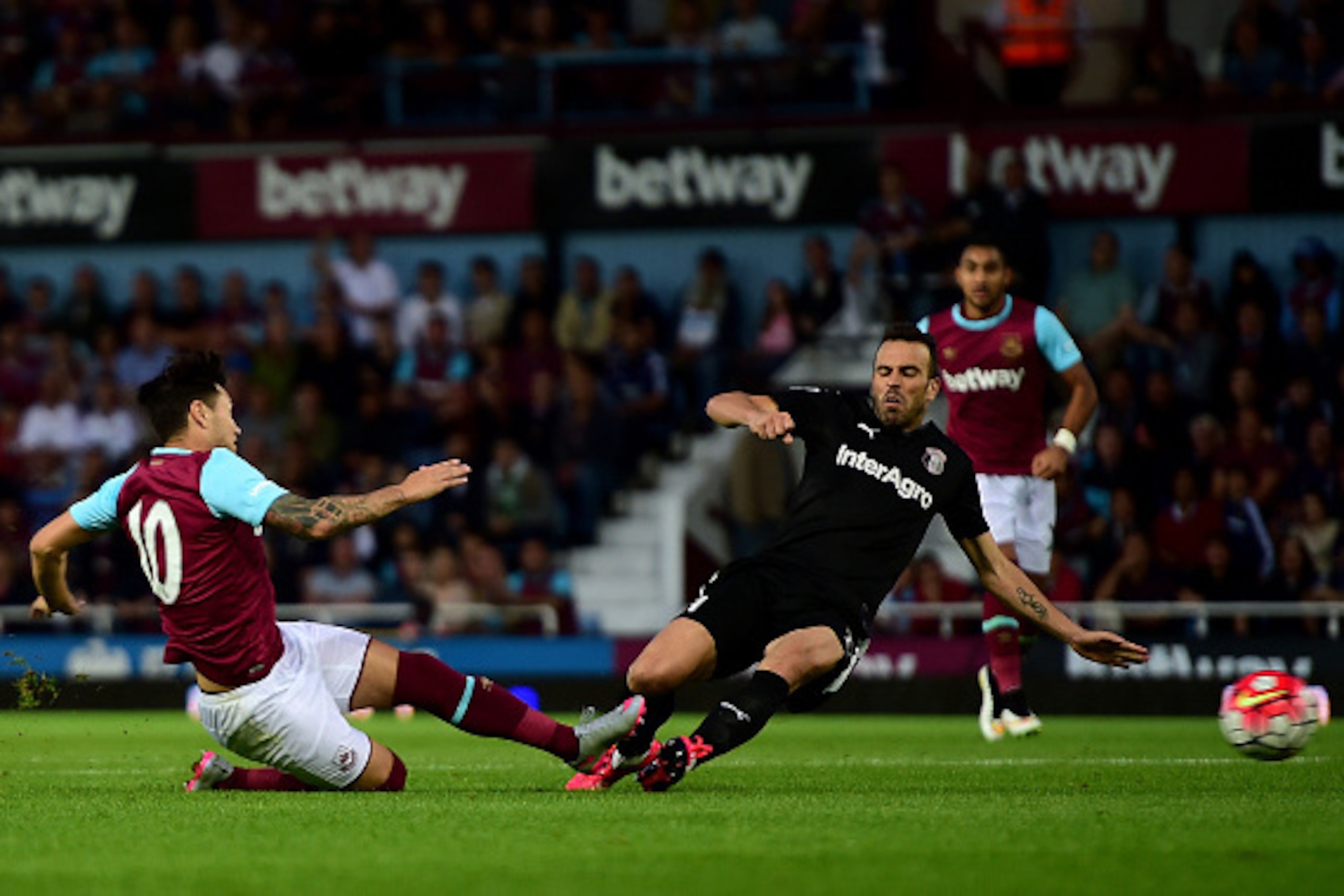 LONDON, ENGLAND - JULY 30:  Mauro Zarate of West Ham scores his side's second goal during the UEFA Europa League third qualifying round match between West Ham United and Astra Giurgiu at the Boleyn Ground on July 30, 2015 in London, England.  (Photo by Da