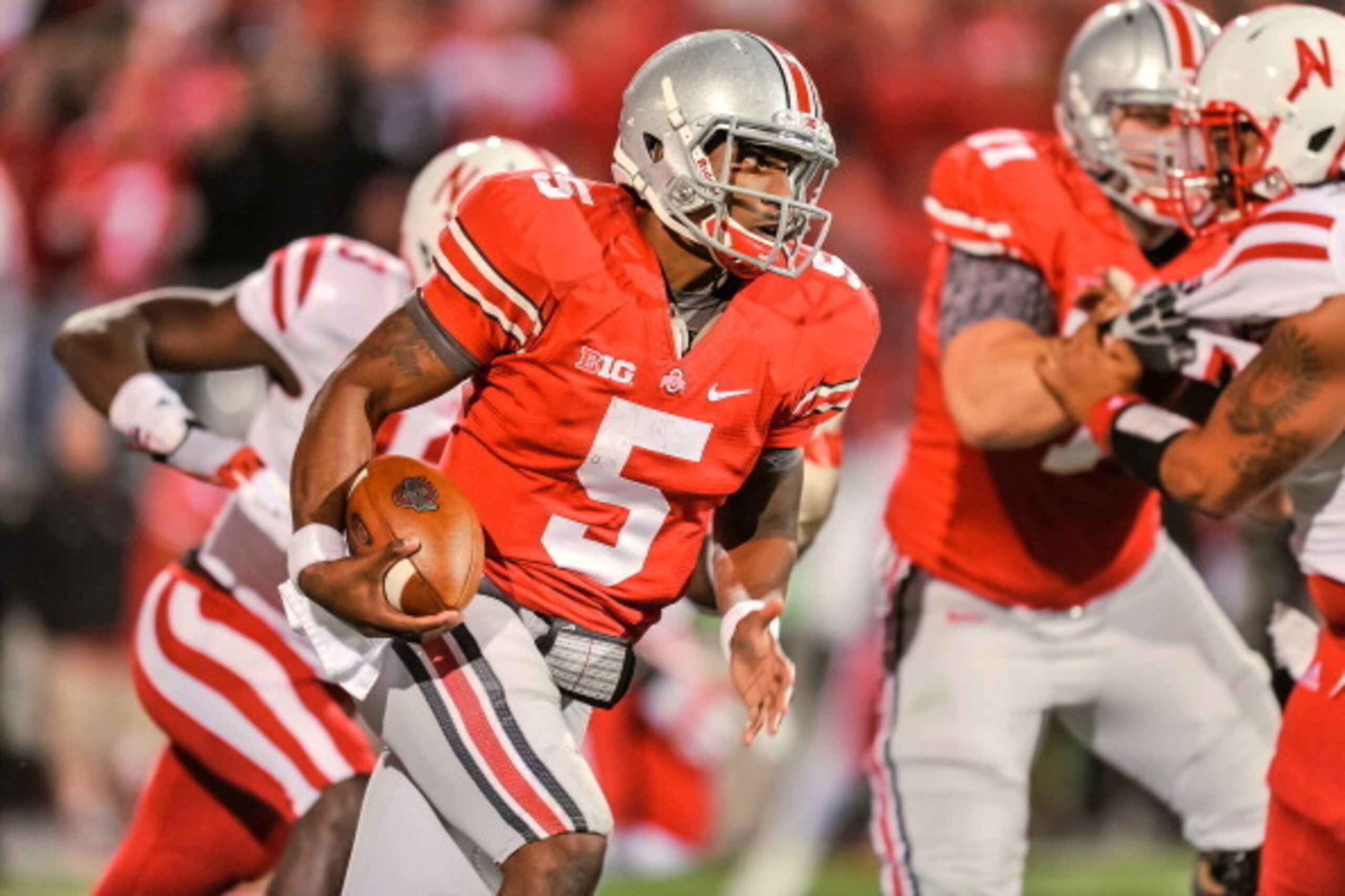 COLUMBUS, OH - OCTOBER 6: Quarterback Braxton Miller #5 of the Ohio State Buckeyes runs with the ball against the Nebraska Cornhuskers at Ohio Stadium on October 6, 2012 in Columbus, Ohio. (Photo by Jamie Sabau/Getty Images) COLUMBUS, OH - OCTOBER 6: Quarterback Braxton Miller #5 of the Ohio State Buckeyes runs with the ball against the Nebraska Cornhuskers at Ohio Stadium on October 6, 2012 in Columbus, Ohio. (Photo by Jamie Sabau/Getty Images)