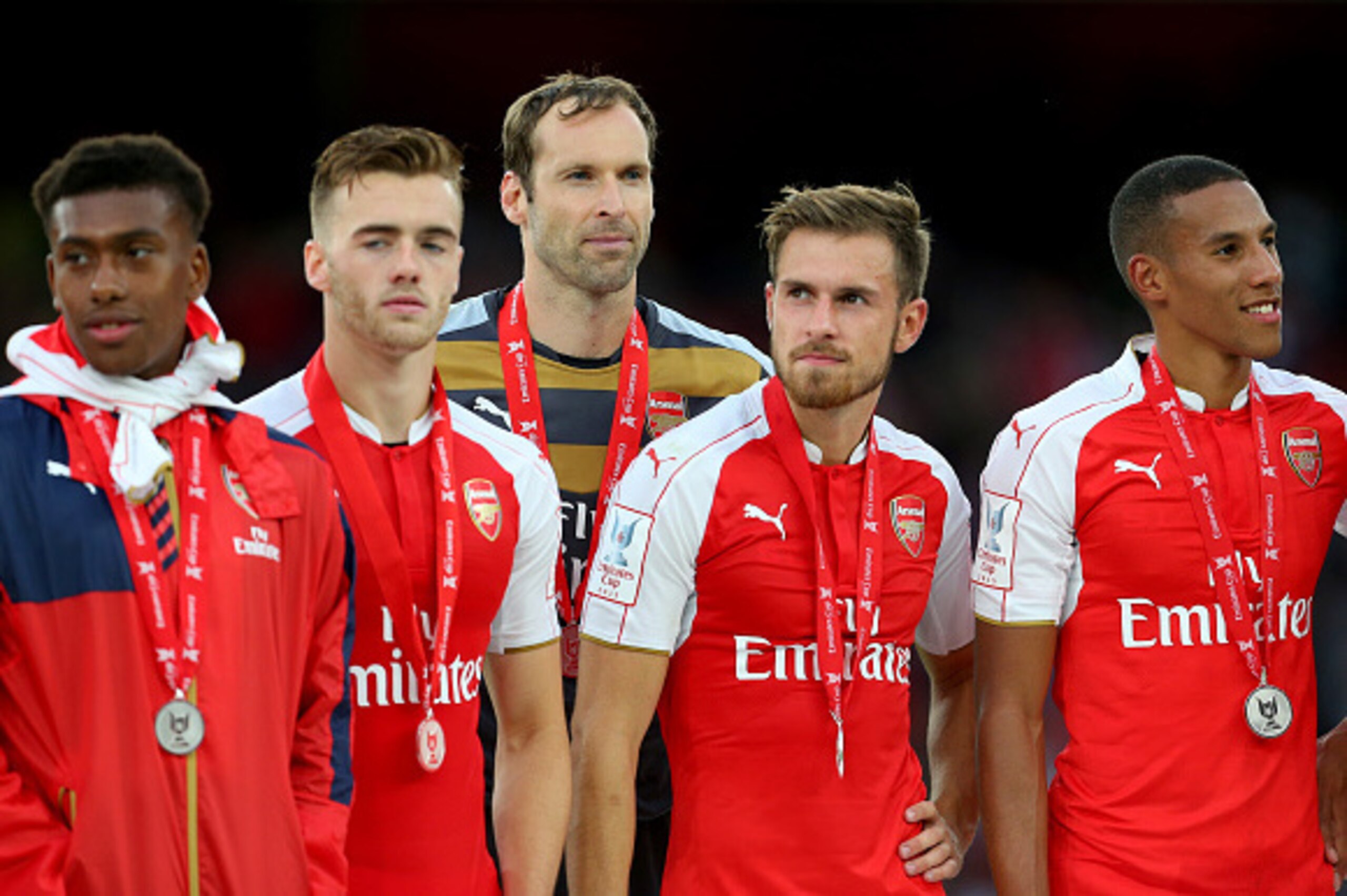 LONDON, ENGLAND - JULY 26:  Petr Cech of Arsenal stands with his team mates Alex Iwobi, Calum Chambers, Aaron Ramsey and Isaac Hayden of Arsenal after the Emirates Cup match between Arsenal and VfL Wolfsburg at Emirates Stadium on July 26, 2015 in London,
