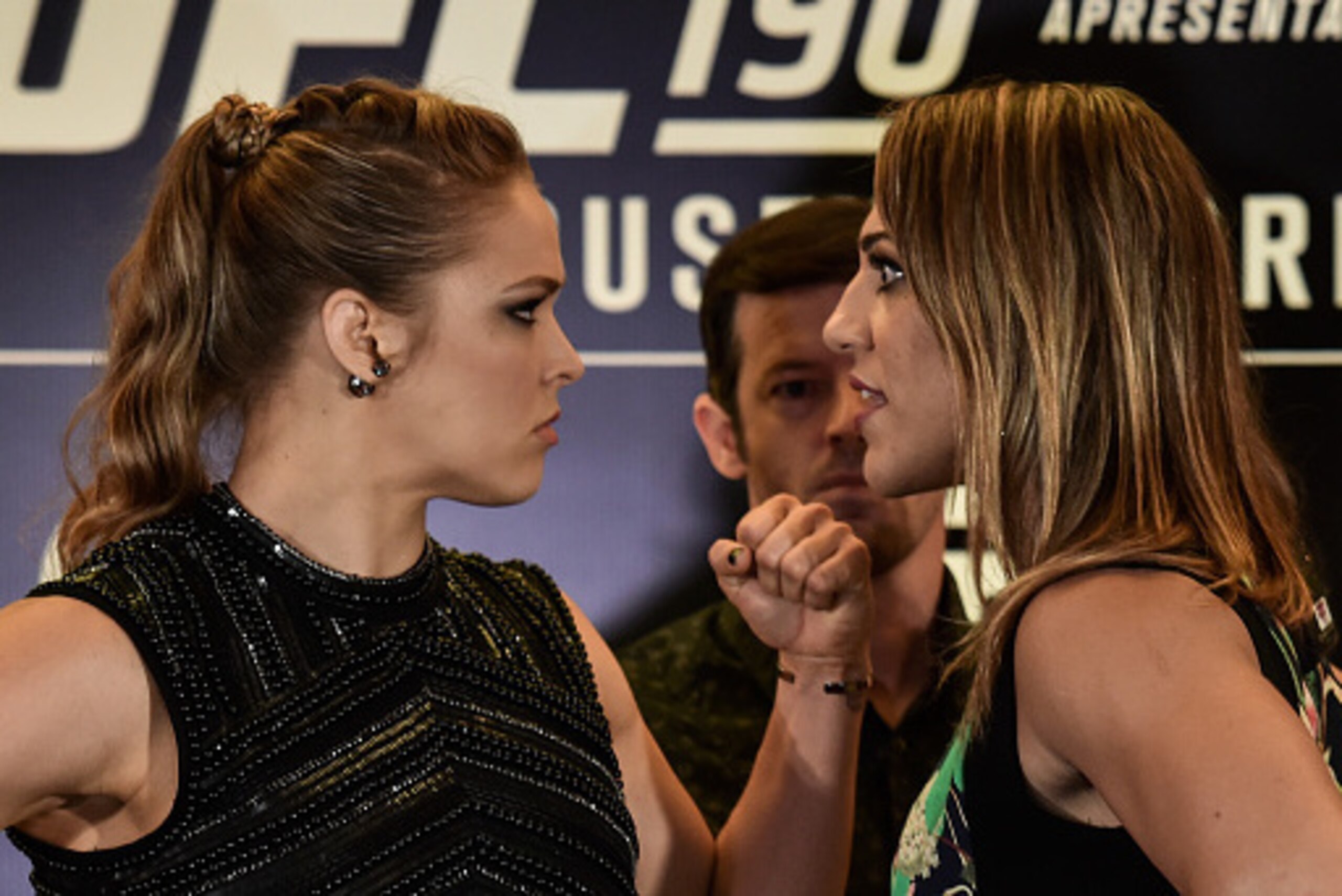 RIO DE JANEIRO, BRAZIL - JULY 30: Bantamweight fighters Ronda Rousey (L) of the United States and Bethe Correia of Brazil face off during Ultimate Media Day at Sheraton Hotel on July 30, 2015 in Rio de Janeiro, Brazil. (Photo by Buda Mendes/Zuffa LLC/Zuff