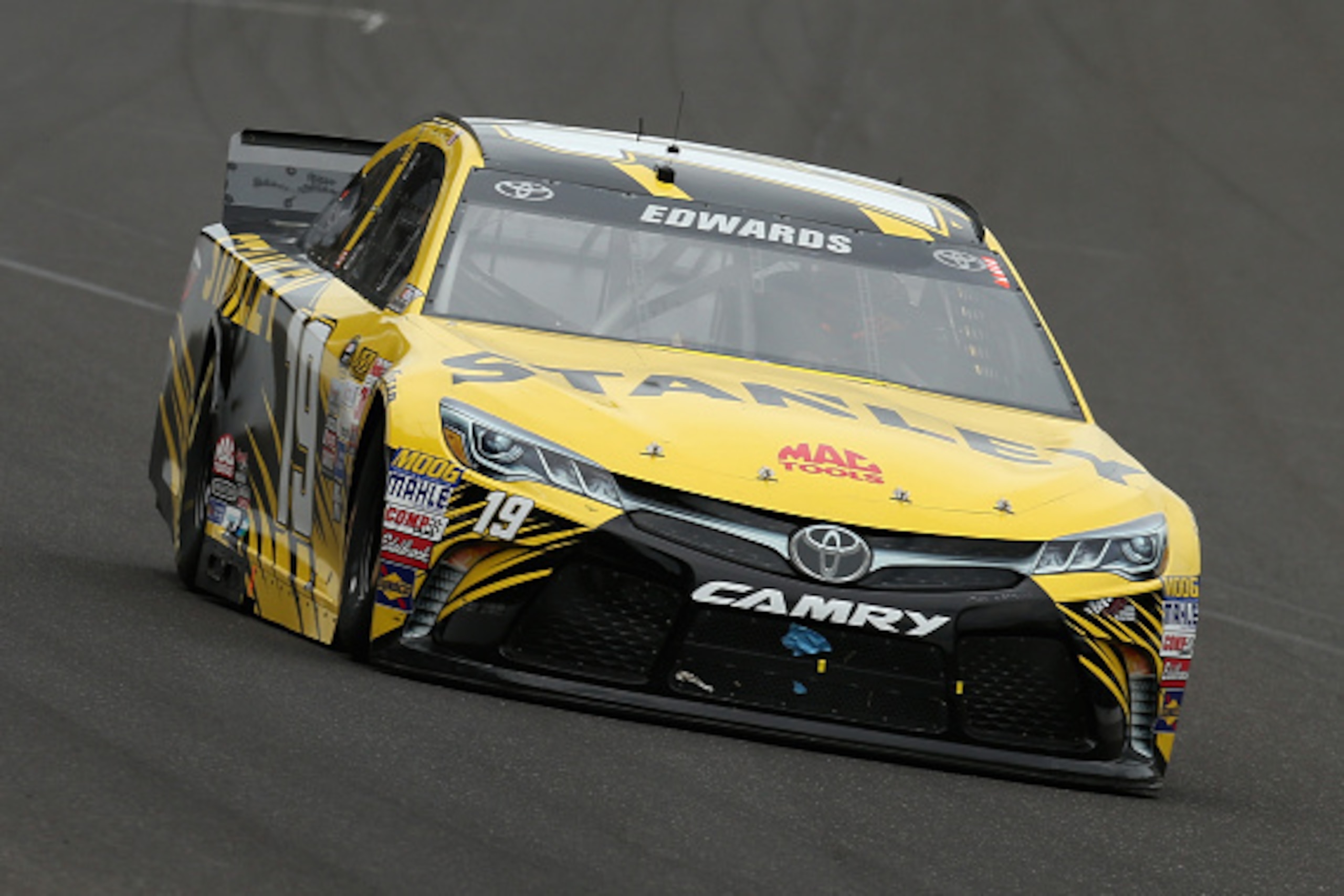 INDIANAPOLIS, IN - JULY 26: Carl Edwards, driver of the #19 Stanley Toyota, races during the NASCAR Sprint Cup Series Crown Royal Presents the Jeff Kyle 400 at the Brickyard at Indianapolis Motor Speedway on July 26, 2015 in Indianapolis, Indiana. (Phot INDIANAPOLIS, IN - JULY 26: Carl Edwards, driver of the #19 Stanley Toyota, races during the NASCAR Sprint Cup Series Crown Royal Presents the Jeff Kyle 400 at the Brickyard at Indianapolis Motor Speedway on July 26, 2015 in Indianapolis, Indiana. (Phot