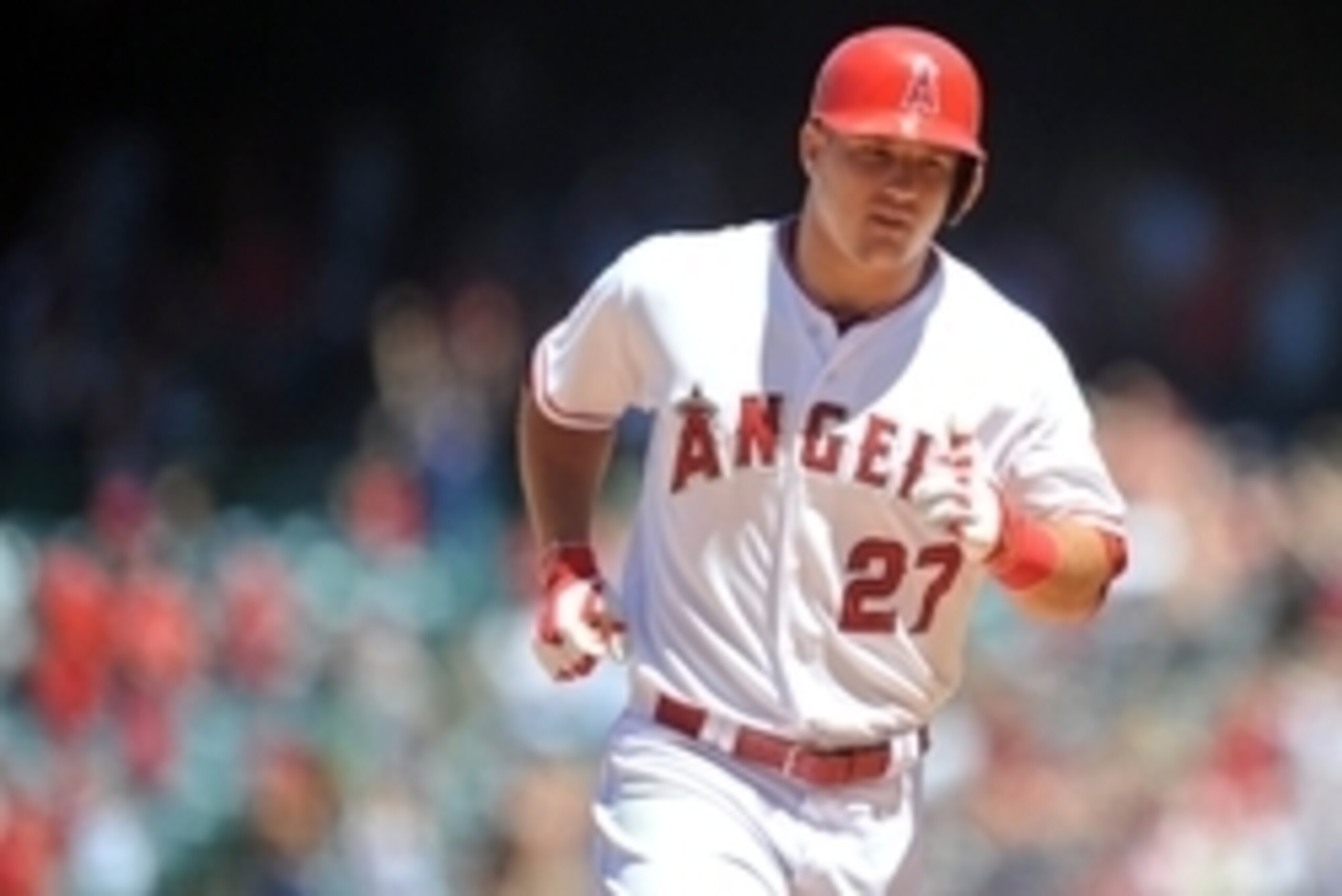 July 26, 2015; Anaheim, CA, USA; Los Angeles Angels center fielder Mike Trout (27) rounds the bases after hitting a grand slam home run in the sixth inning against the Texas Rangers at Angel Stadium of Anaheim. Mandatory Credit: Gary A. Vasquez-USA TODAY July 26, 2015; Anaheim, CA, USA; Los Angeles Angels center fielder Mike Trout (27) rounds the bases after hitting a grand slam home run in the sixth inning against the Texas Rangers at Angel Stadium of Anaheim. Mandatory Credit: Gary A. Vasquez-USA TODAY