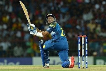 Sri Lankan cricketer Tillakaratne Dilshan plays a shot during the first Twenty20 International cricket match between Sri Lanka and Pakistan at The R Premadasa International Cricket Stadium in Colombo on July 30, 2015. AFP PHOTO / ISHARA S KODIKARA        