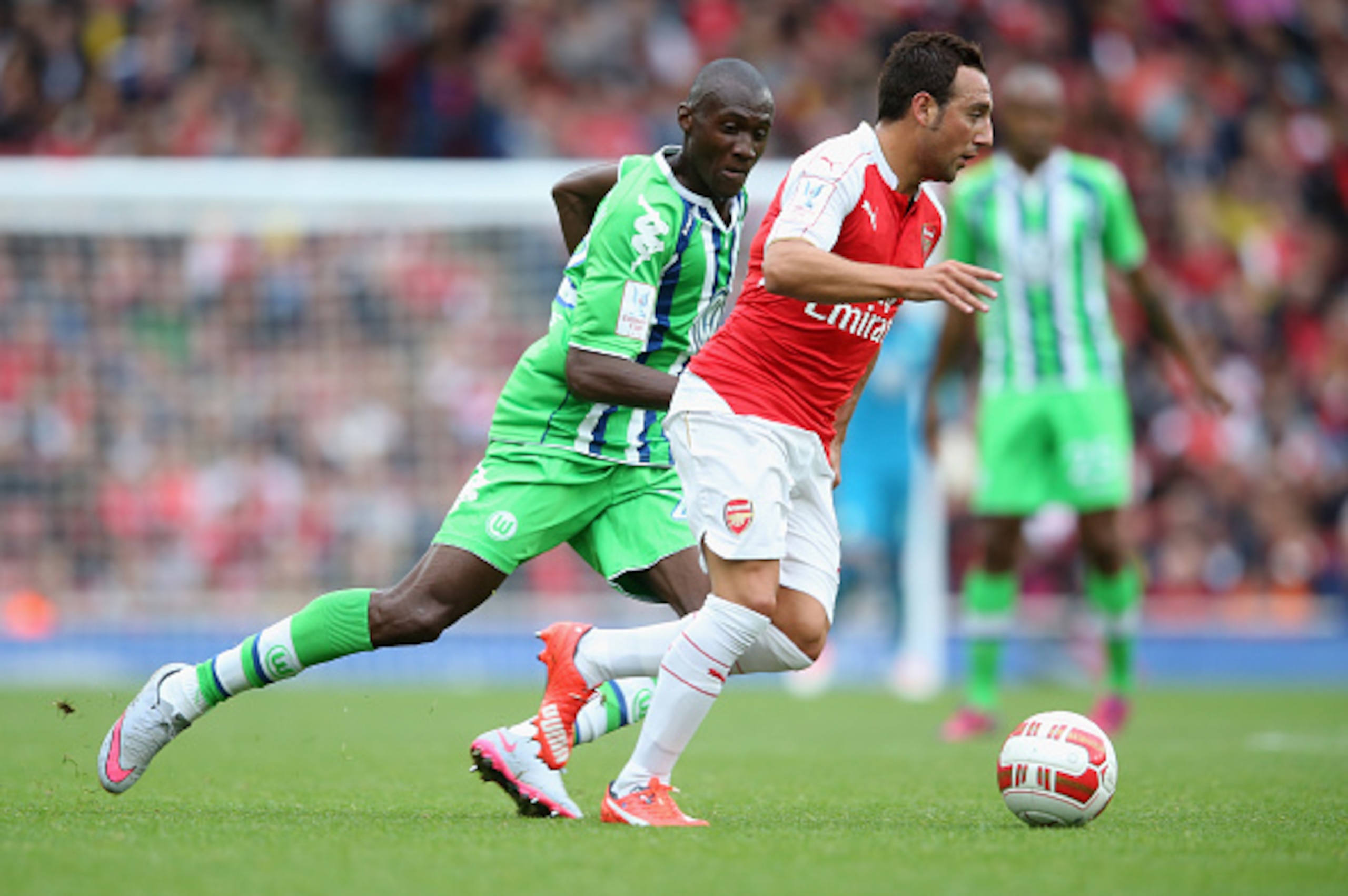 LONDON, ENGLAND - JULY 26: Santi Cazorla of Arsenal runs with the ball during the Emirates Cup match between Arsenal and VfL Wolfsburg at the Emirates Stadium on July 26, 2015 in London, England.  (Photo by David Rogers/Getty Images)