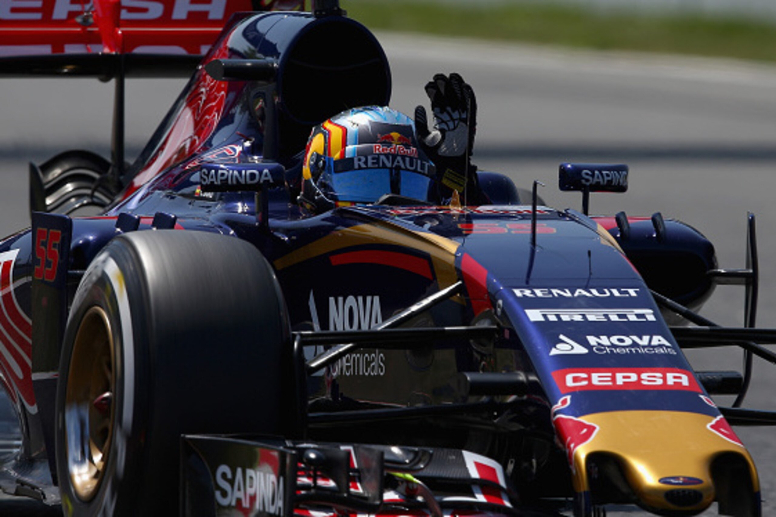 MONTMELO, SPAIN - MAY 09: Carlos Sainz of Spain and Scuderia Toro Rosso waves to the crowd after qualifying in fifth position during qualifying for the Spanish Formula One Grand Prix at Circuit de Catalunya on May 9, 2015 in Montmelo, Spain. (Photo by C MONTMELO, SPAIN - MAY 09: Carlos Sainz of Spain and Scuderia Toro Rosso waves to the crowd after qualifying in fifth position during qualifying for the Spanish Formula One Grand Prix at Circuit de Catalunya on May 9, 2015 in Montmelo, Spain. (Photo by C