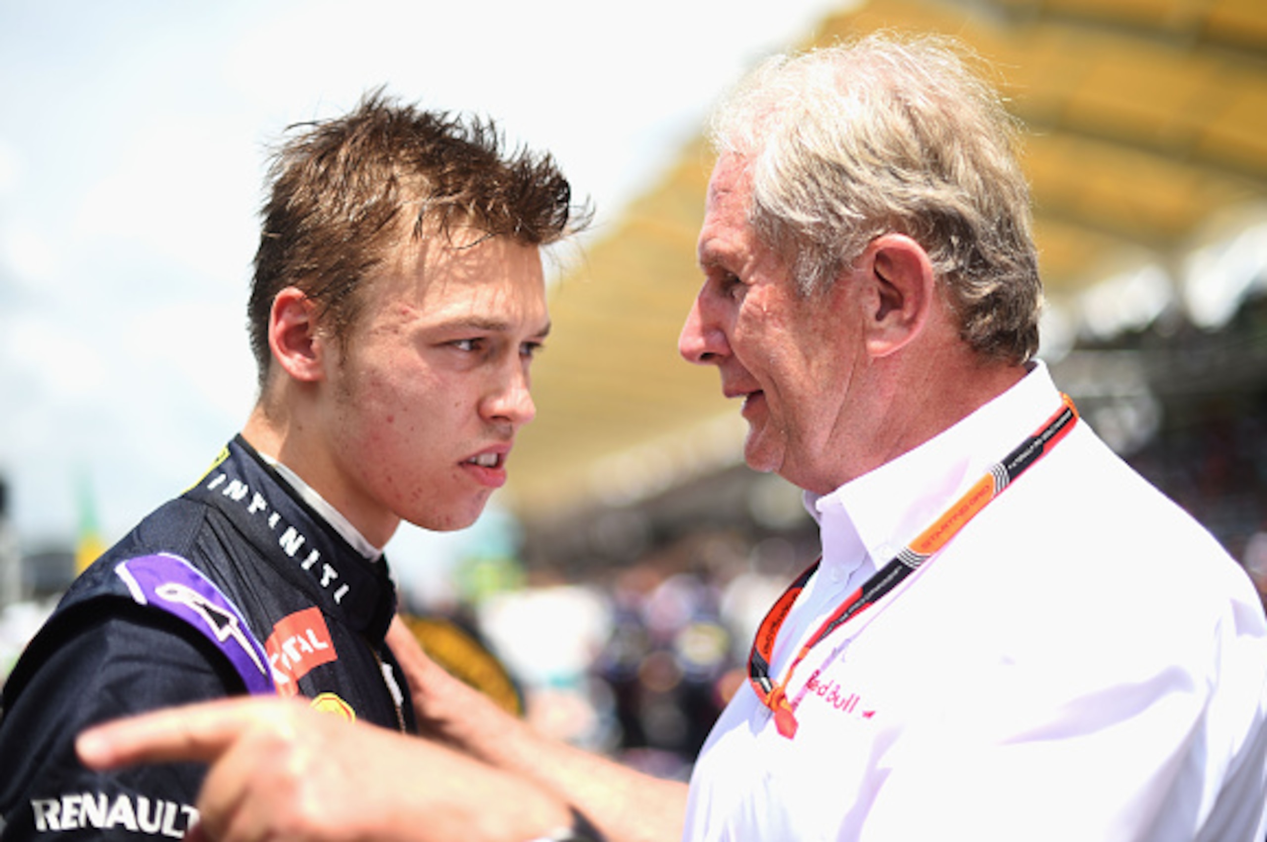 KUALA LUMPUR, MALAYSIA - MARCH 29: Daniil Kvyat of Russia and Infiniti Red Bull Racing speaks with team consultant Dr Helmut Marko on the grid before the Malaysia Formula One Grand Prix at Sepang Circuit on March 29, 2015 in Kuala Lumpur, Malaysia. (Pho KUALA LUMPUR, MALAYSIA - MARCH 29: Daniil Kvyat of Russia and Infiniti Red Bull Racing speaks with team consultant Dr Helmut Marko on the grid before the Malaysia Formula One Grand Prix at Sepang Circuit on March 29, 2015 in Kuala Lumpur, Malaysia. (Pho
