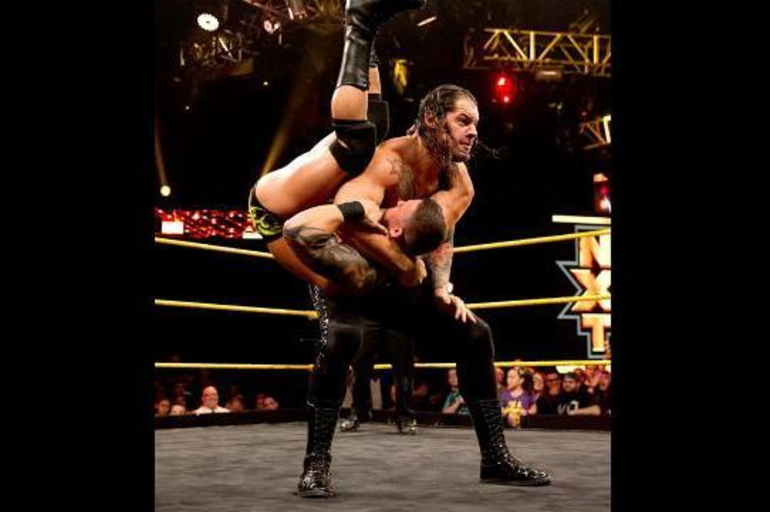 Baron Corbin prepares to hit Jesse Sorensen with End of Days.