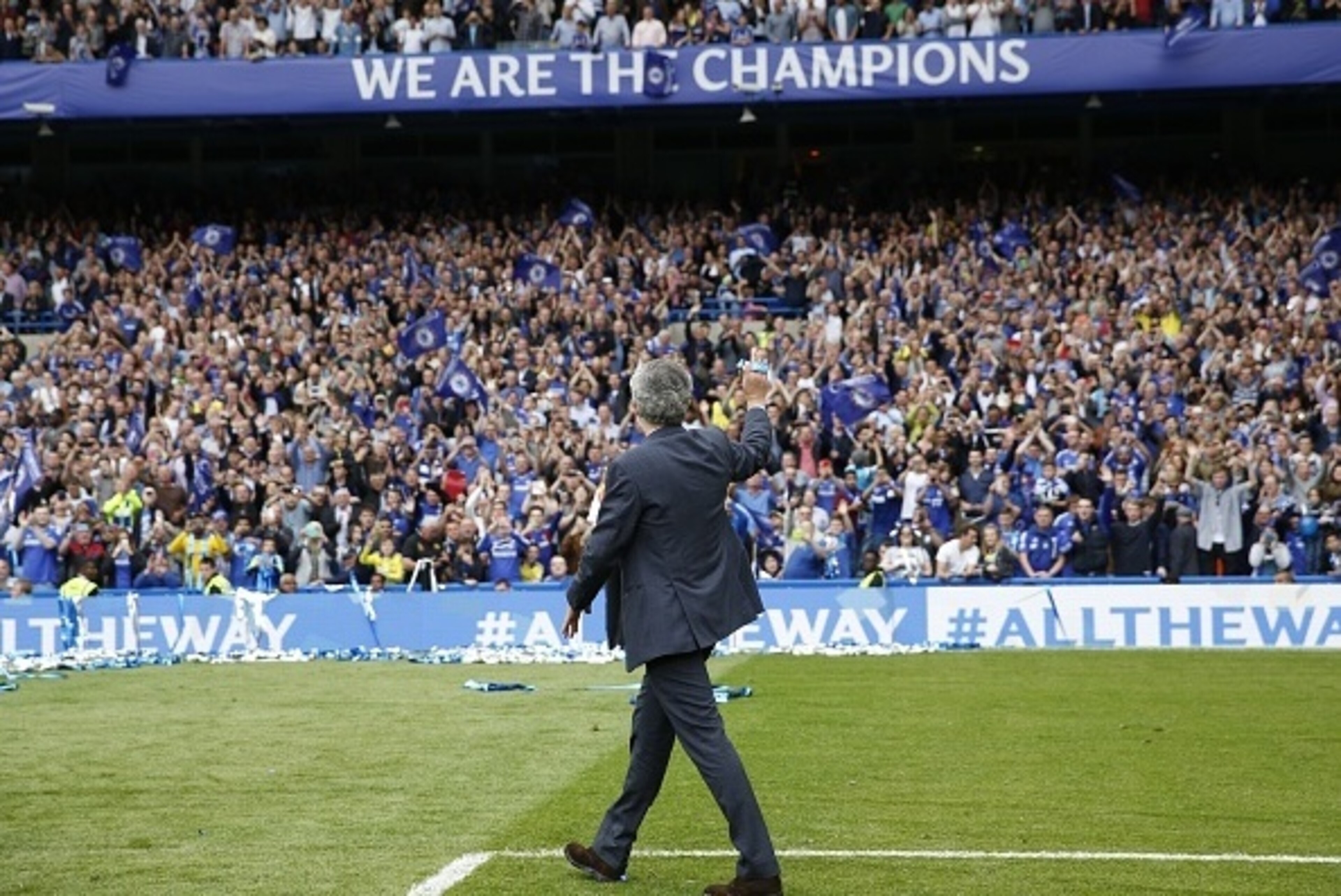 Chelsea's Portuguese manager Jose Mourinho waves to fans following the Premier League trophy presentation after the English Premier League football match between Chelsea and Sunderland at Stamford Bridge in London on May 24, 2015. Chelsea were officially 