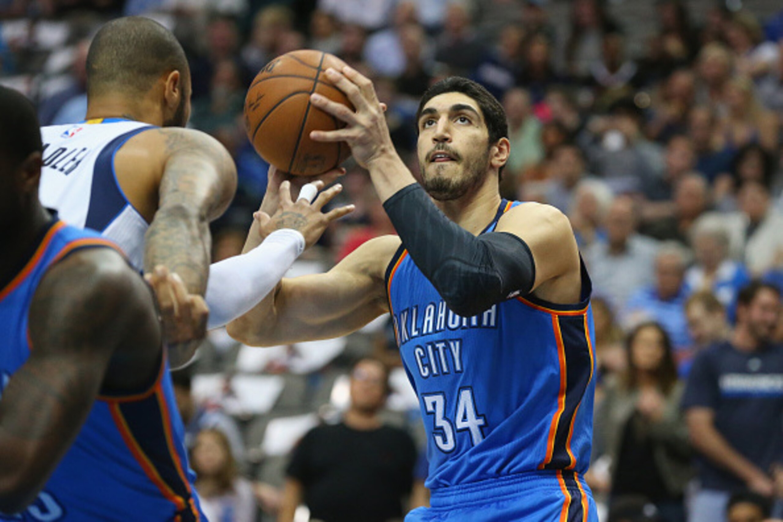 DALLAS, TX - MARCH 16:  Enes Kanter #34 of the Oklahoma City Thunder at American Airlines Center on March 16, 2015 in Dallas, Texas.  NOTE TO USER: User expressly acknowledges and agrees that, by downloading and or using this photograph, User is consentin