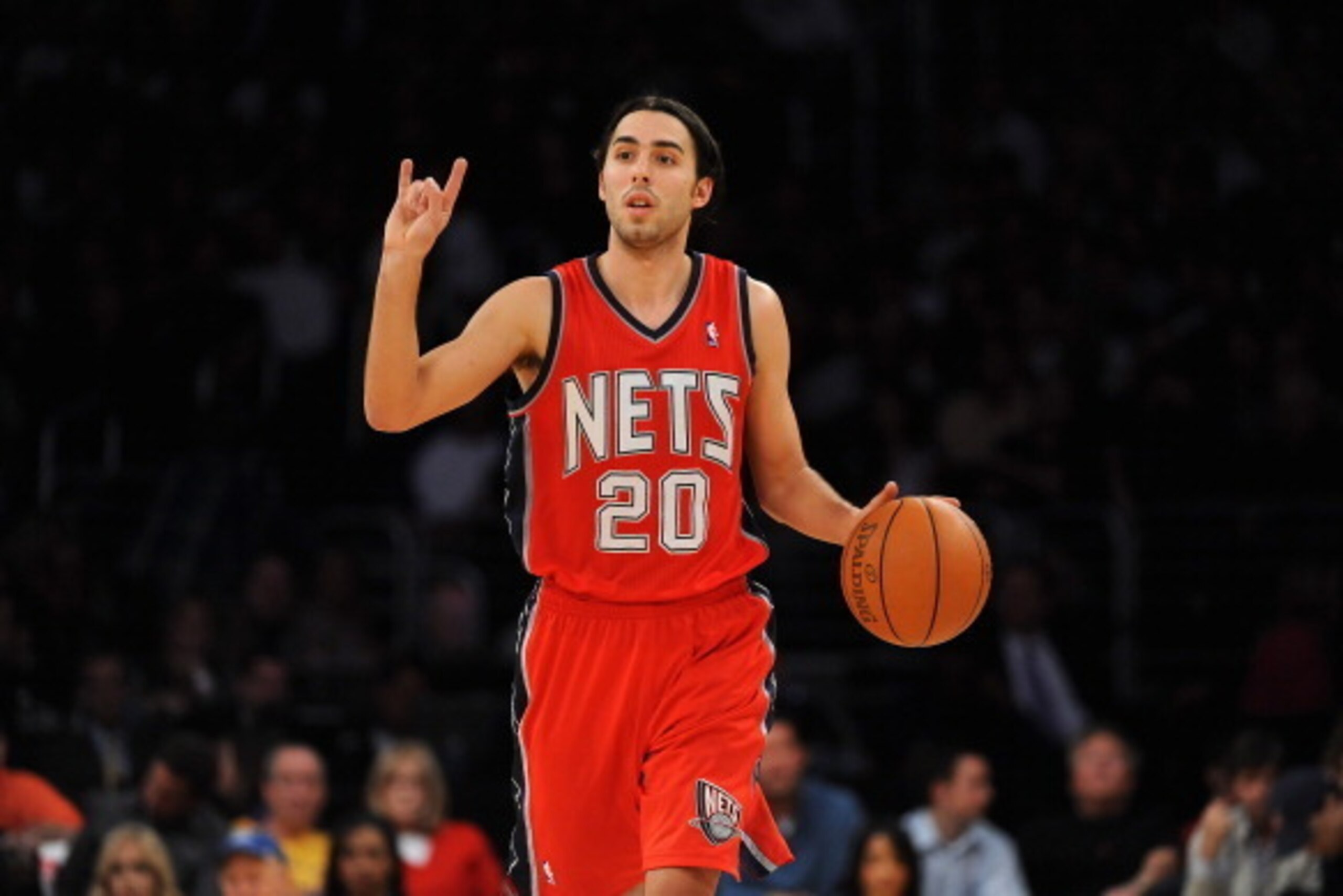LOS ANGELES - JANUARY 14:  Sasha Vujacic #20 of the New Jersey Nets drives the ball upcourt during the game against the Los Angeles Lakers at Staples Center on January 14, 2011 in Los Angeles, California. NOTE TO USER: User expressly acknowledges and agre
