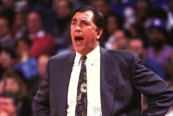 LANDOVER, MD - FEBUARY 17:  Rudy Tomjanovich, head coach of the Houston Rockets, during a NBA basketball game against the Washington Bullets at USAir Arena on Febuary 17, 1995 in Landover, Maryland.  (Photo by Mitchell Layton/Getty Images)