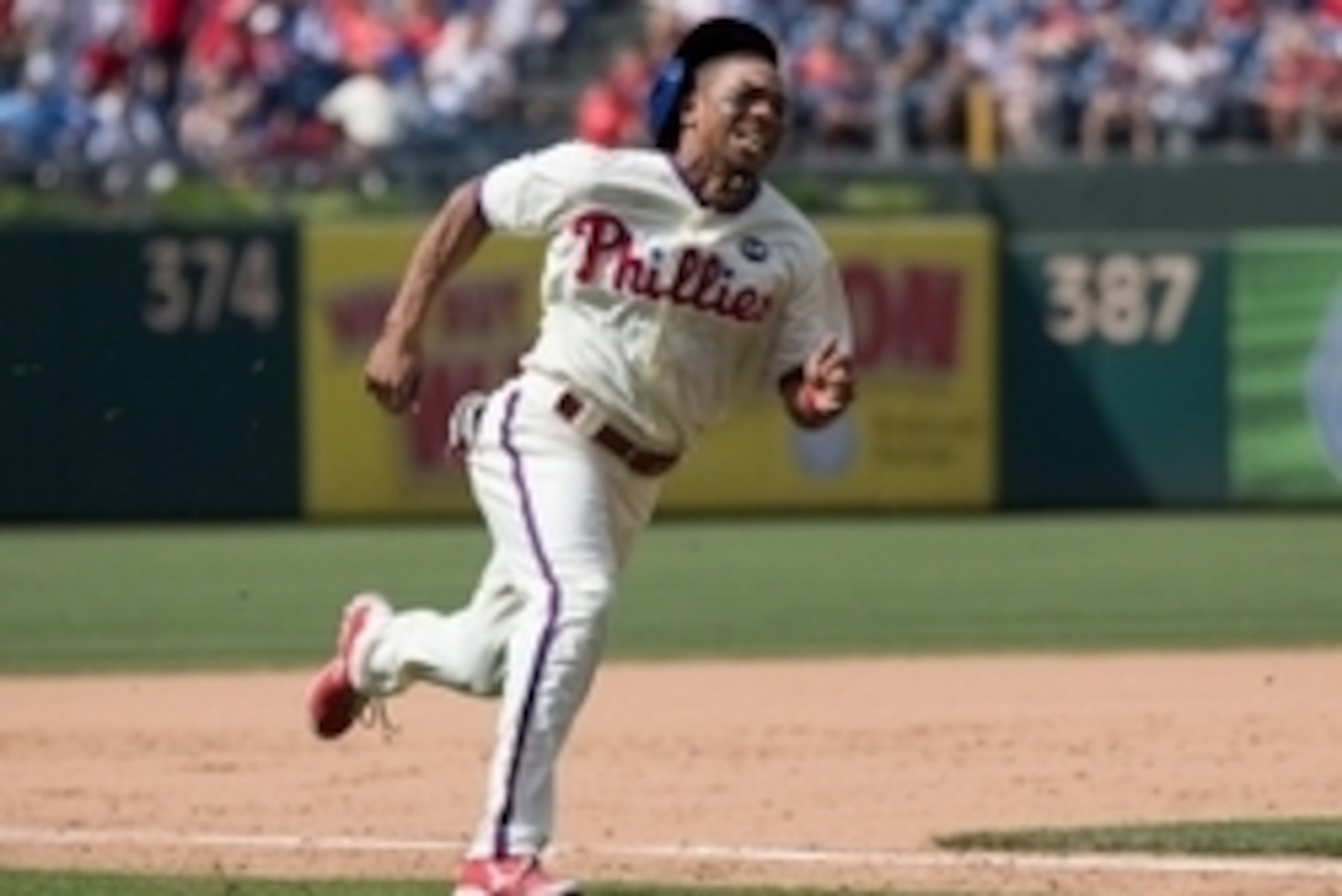 Jun 7, 2015; Philadelphia, PA, USA; Philadelphia Phillies left fielder Ben Revere (2) rounds home on his way to scoring against the San Francisco Giants during the seventh inning at Citizens Bank Park. The San Francisco Giants won 6-4. Mandatory Credit: B