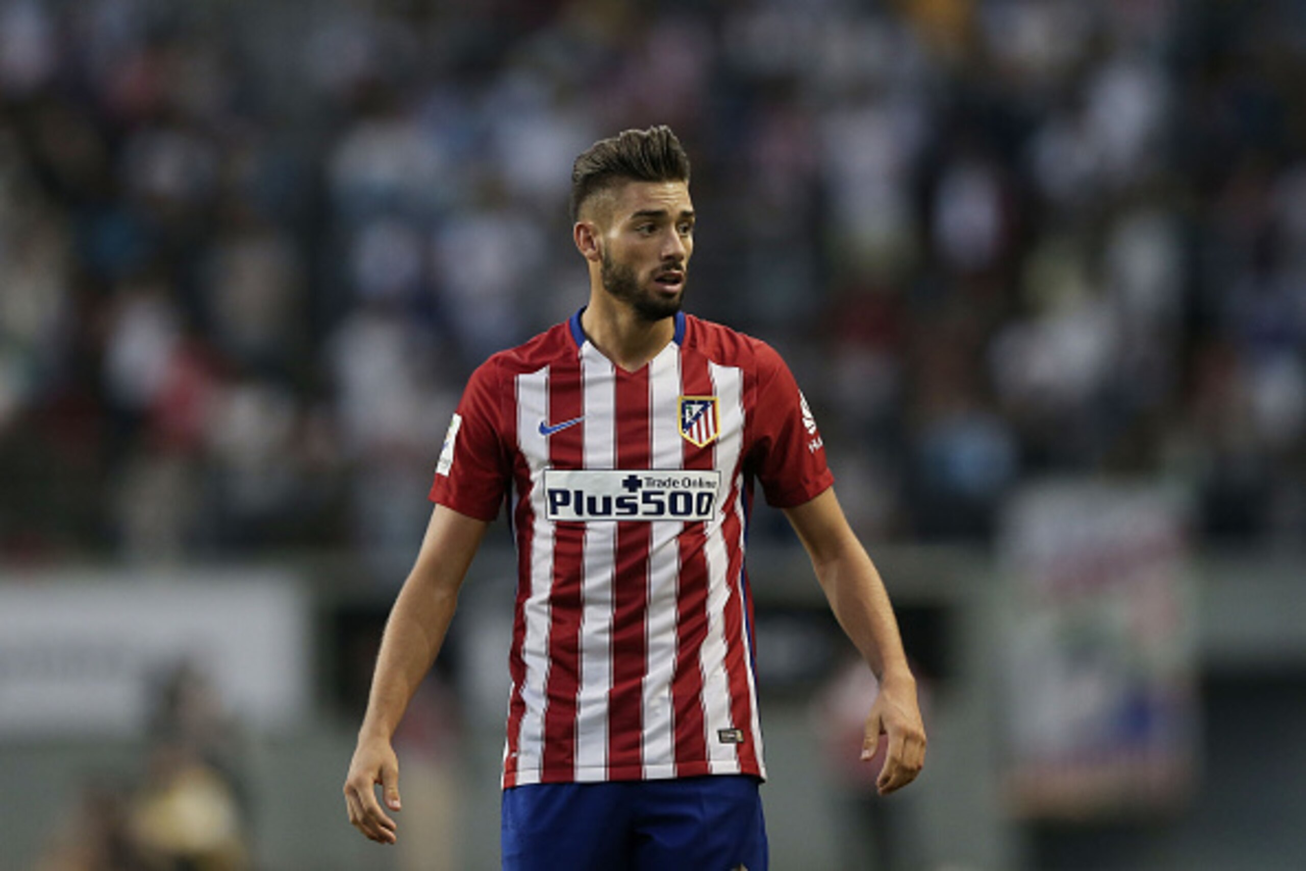 TOSU, JAPAN - AUGUST 01:  Yannick Carrasco #21 of Atletico Madrid reacts after a penalty call against Sagan Tosu F.C. during the friendly match between Atletico Madrid and Sagan Tosu F.C. at Tosu Stadium on August 1, 2015 in Tosu, Japan.  (Photo by Chris 