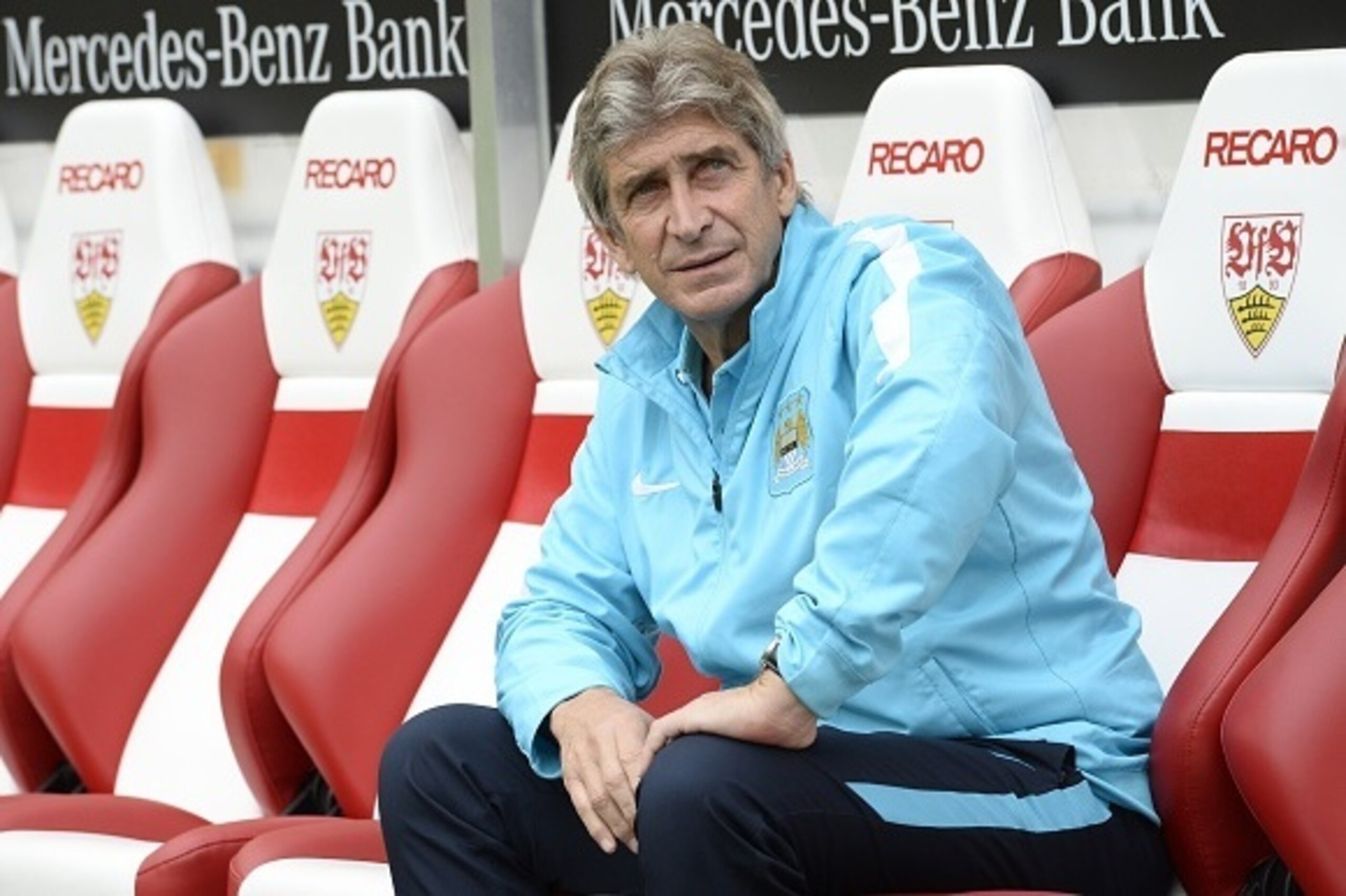 Manchester's Chilean head coach Manuel Pellegrini waits ahead of the friendly football match between VfB Stuttgart and Manchester City in Stuttgart, southern Germany, on August 1, 2015. AFP PHOTO / THOMAS KIENZLE (Photo credit should read THOMAS KI Manchester's Chilean head coach Manuel Pellegrini waits ahead of the friendly football match between VfB Stuttgart and Manchester City in Stuttgart, southern Germany, on August 1, 2015. AFP PHOTO / THOMAS KIENZLE (Photo credit should read THOMAS KI
