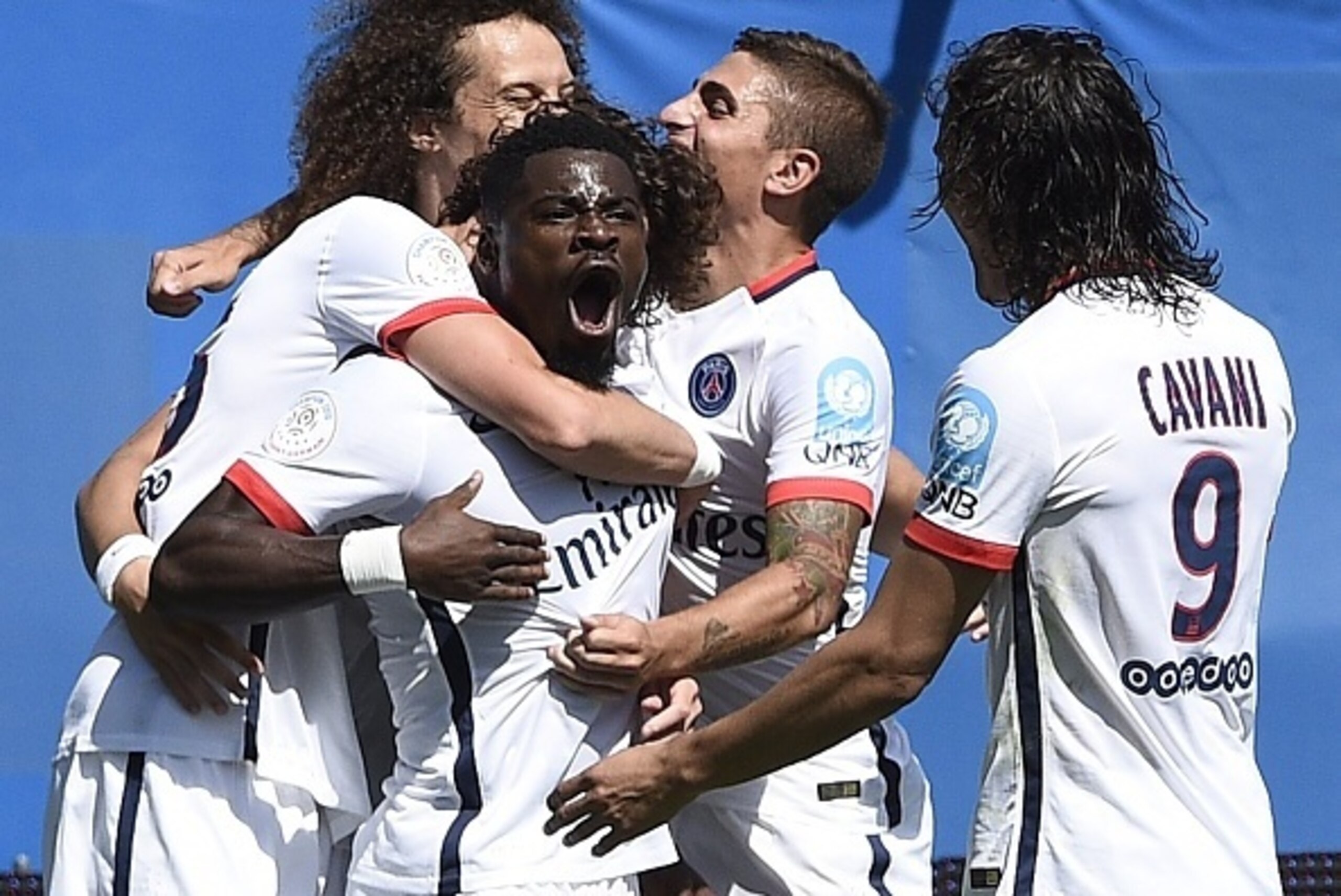 Paris Saint-Germain's French defender Serge Aurier (C) celebrates his goal during the French Trophy of Champions football match against Paris-Saint-Germain vs Lyon at Saputo stadium in Montreal on August 1, 2015   AFP PHOTO / FRANCK FIFE        (Photo cre
