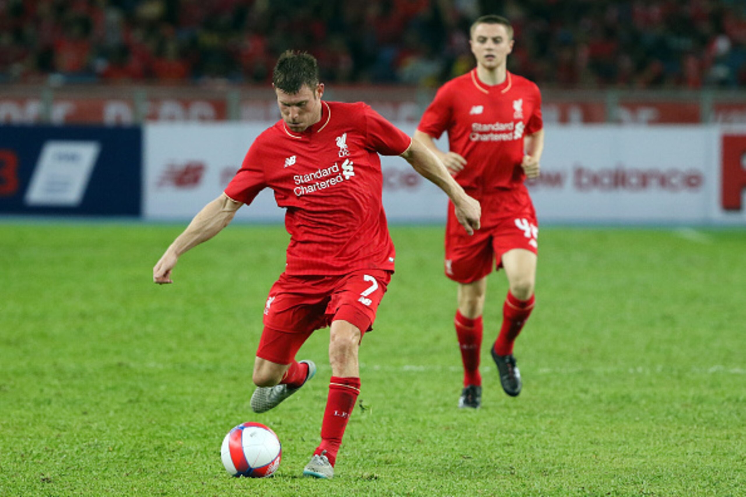 KUALA LUMPUR, MALAYSIA - JULY 24:  James Milner in action during the international friendly match between Malaysia XI and Liverpool FC at Bukit Jalil National Stadium on July 24, 2015 in Kuala Lumpur, Malaysia.  (Photo by How Foo Yeen/Getty Images)