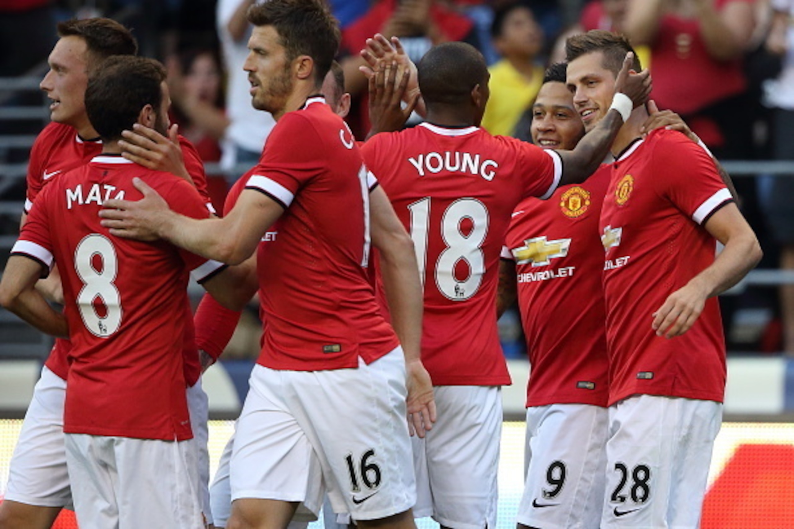 SEATTLE, WA - JULY 17:  Morgan Schneiderlin of Manchester United celebrates after scoring a goal to make it 0-1 with his team mates during the International Champions Cup 2015 match between Club America and Manchester United  at CenturyLink Field on July 