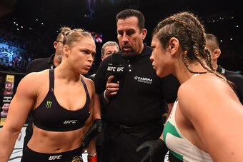 RIO DE JANEIRO, BRAZIL - AUGUST 01:  UFC strawweight champion Ronda Rousey of the United States Bethe Correia of Brazil face off in their UFC women's bantamweight championship bout during the UFC 190 event inside HSBC Arena on August 1, 2015 in Rio de Jan