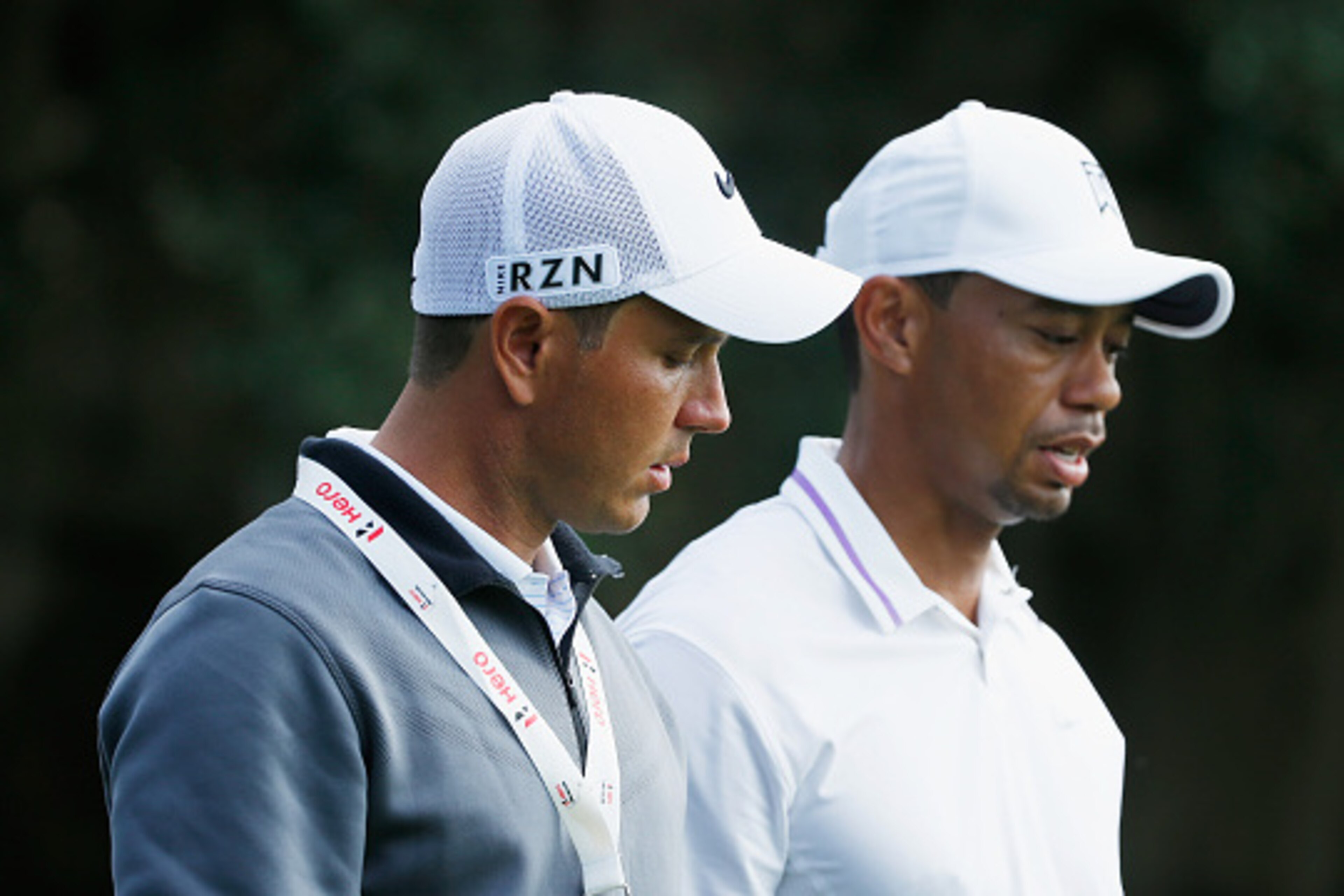 WINDERMERE, FL - DECEMBER 03:  Tiger Woods chats with swing instructor Chris Como during the pro-am prior to the start of the Hero World Challenge at the Isleworth Golf & Country Club on December 3, 2014 in Windermere, Florida.  (Photo by Scott Halleran/G