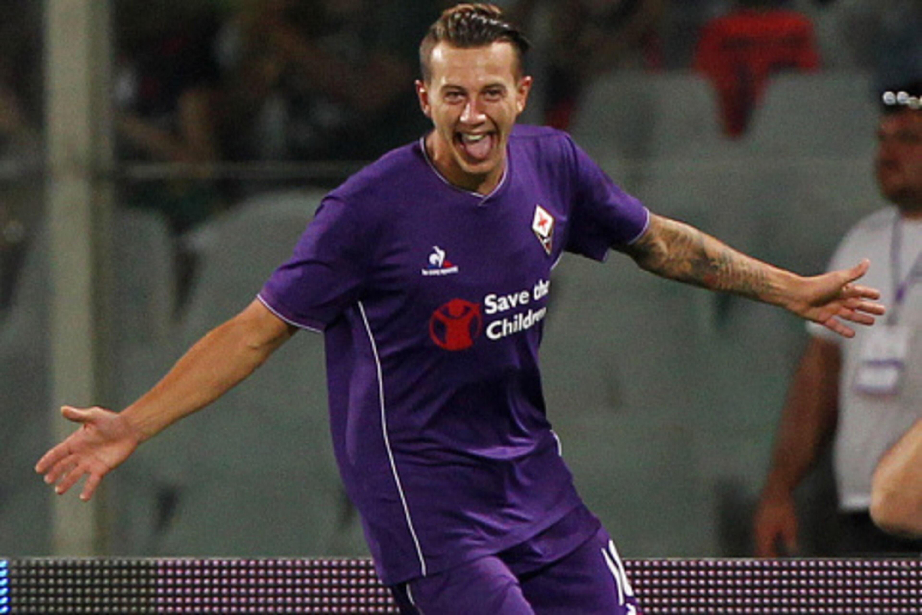 FLORENCE, ITALY - AUGUST 02:  Federico Bernardeschi of ACF Fiorentina celebrates after scoring the opening goal during the preseason friendly match between ACF Fiorentina and FC Barcelona at Artemio Franchi on August 2, 2015 in Florence, Italy.  (Photo by