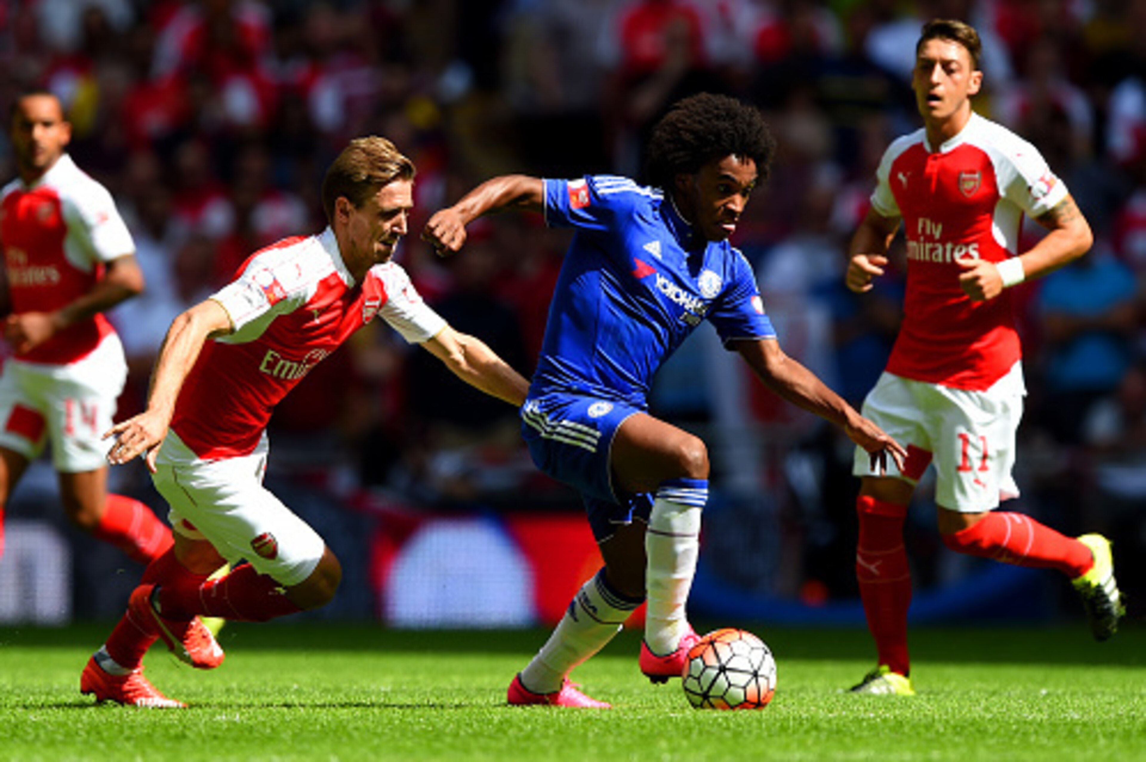 LONDON, ENGLAND - AUGUST 02:  Willian of Chelsea and Nacho Monreal of Arsenal compete for the ball during the FA Community Shield match between Chelsea and Arsenal at Wembley Stadium on August 2, 2015 in London, England.  (Photo by Shaun Botterill/Getty I