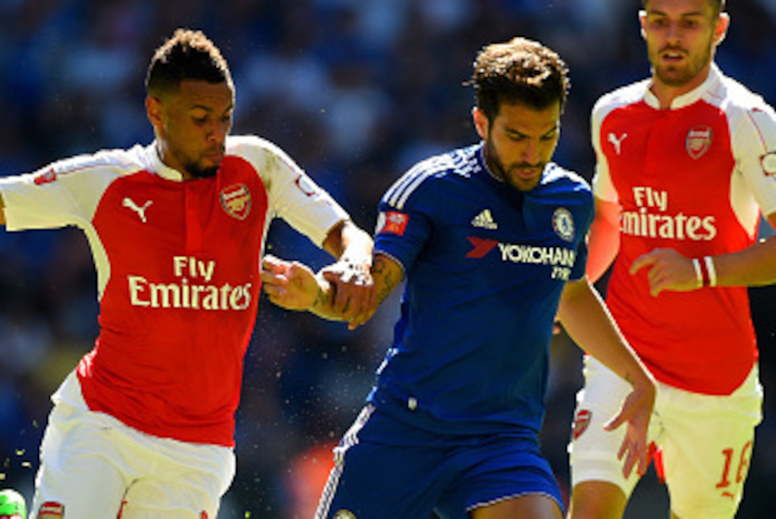LONDON, ENGLAND - AUGUST 02:  Cesc Fabregas of Chelsea battles for the ball with Francis Coquelin of Arsenal and Aaron Ramsey of Arsenal during the FA Community Shield match between Chelsea and Arsenal at Wembley Stadium on August 2, 2015 in London, Engla